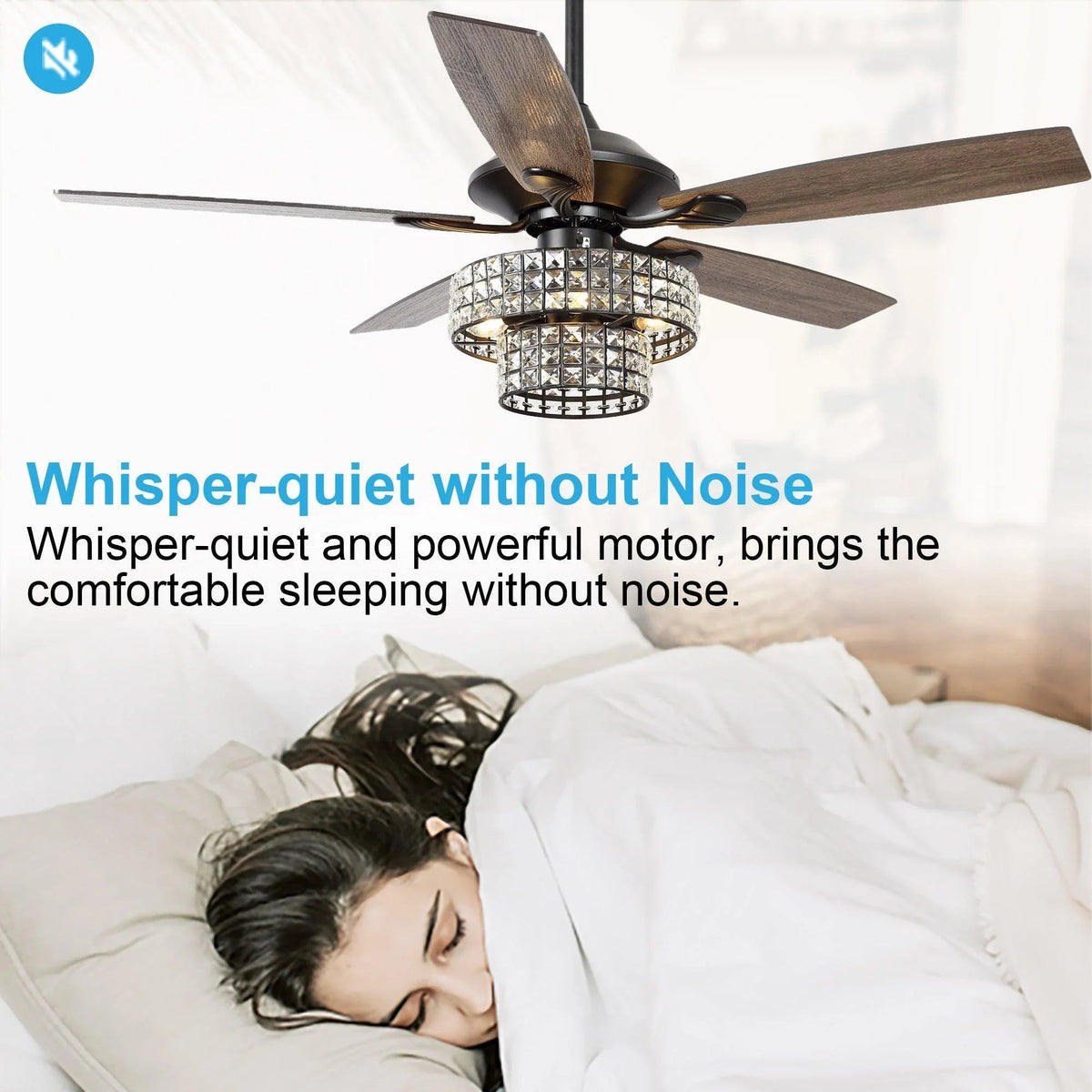 Black ceiling fan with wood blades and crystal globe light over bed