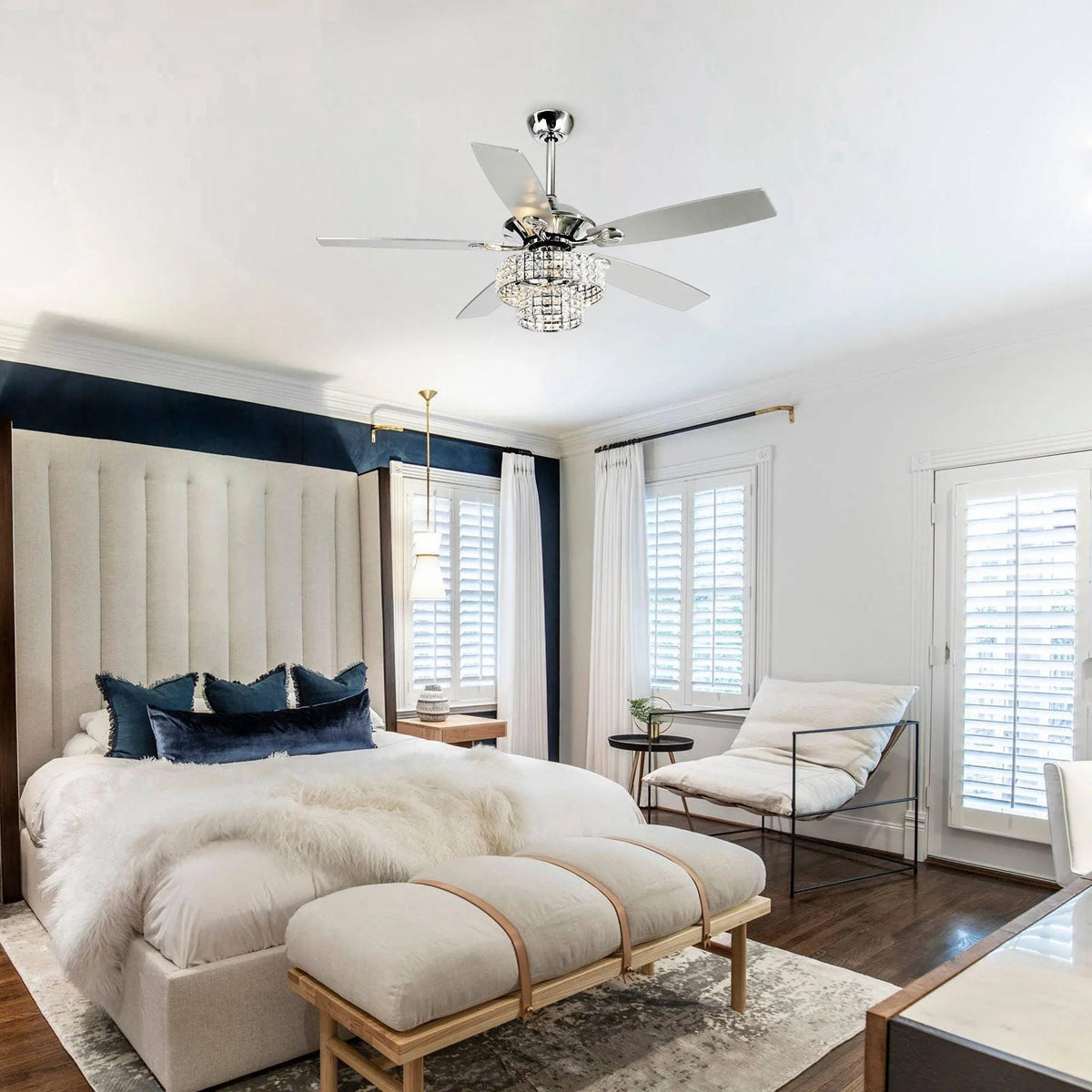 Modern ceiling fan with chrome finish, crystal light kit, and 5 white blades