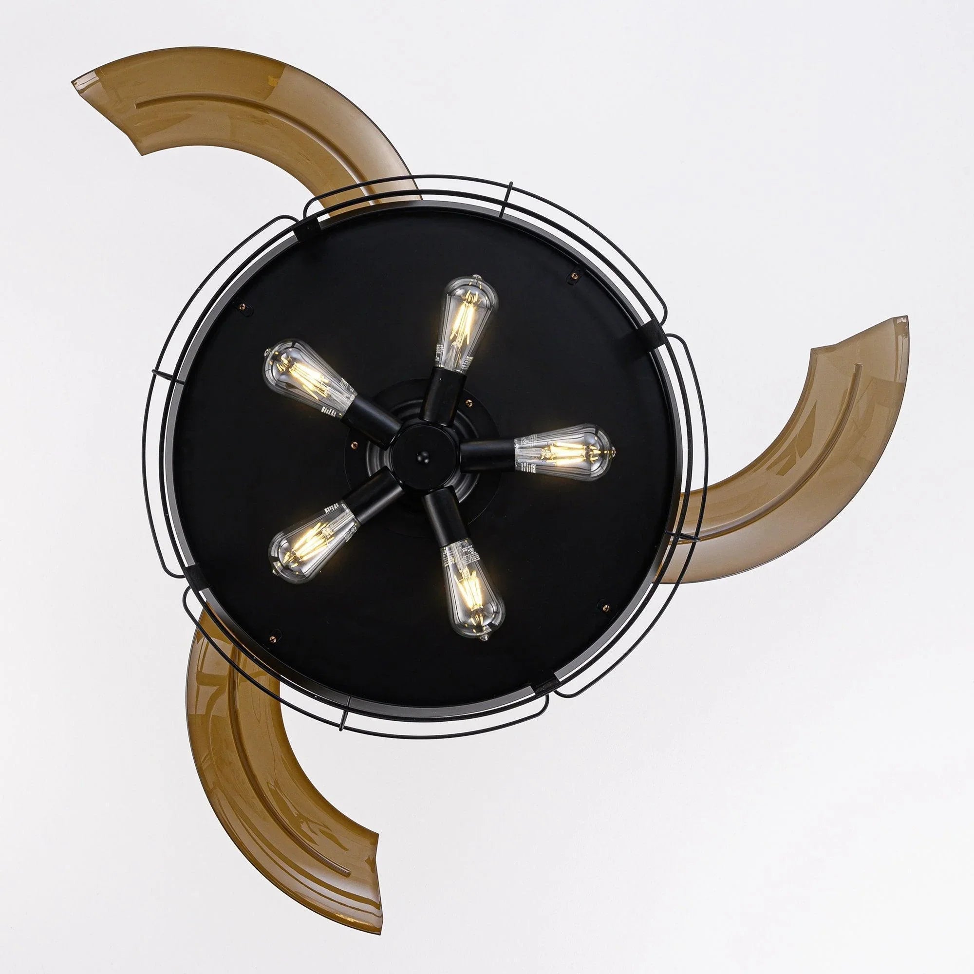 Close-up of black fan light with five exposed bulbs and bronze blade detail