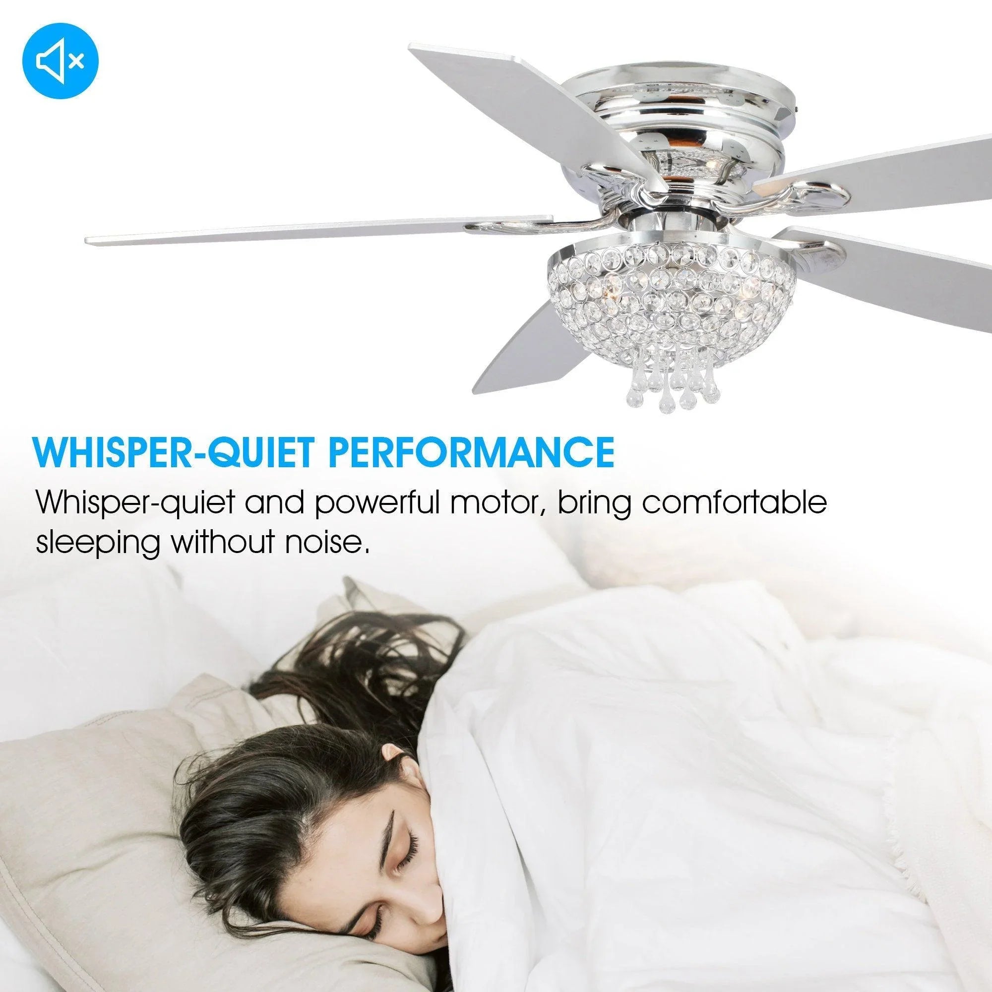 Chrome ceiling fan with crystal light fixture and five blades above bed