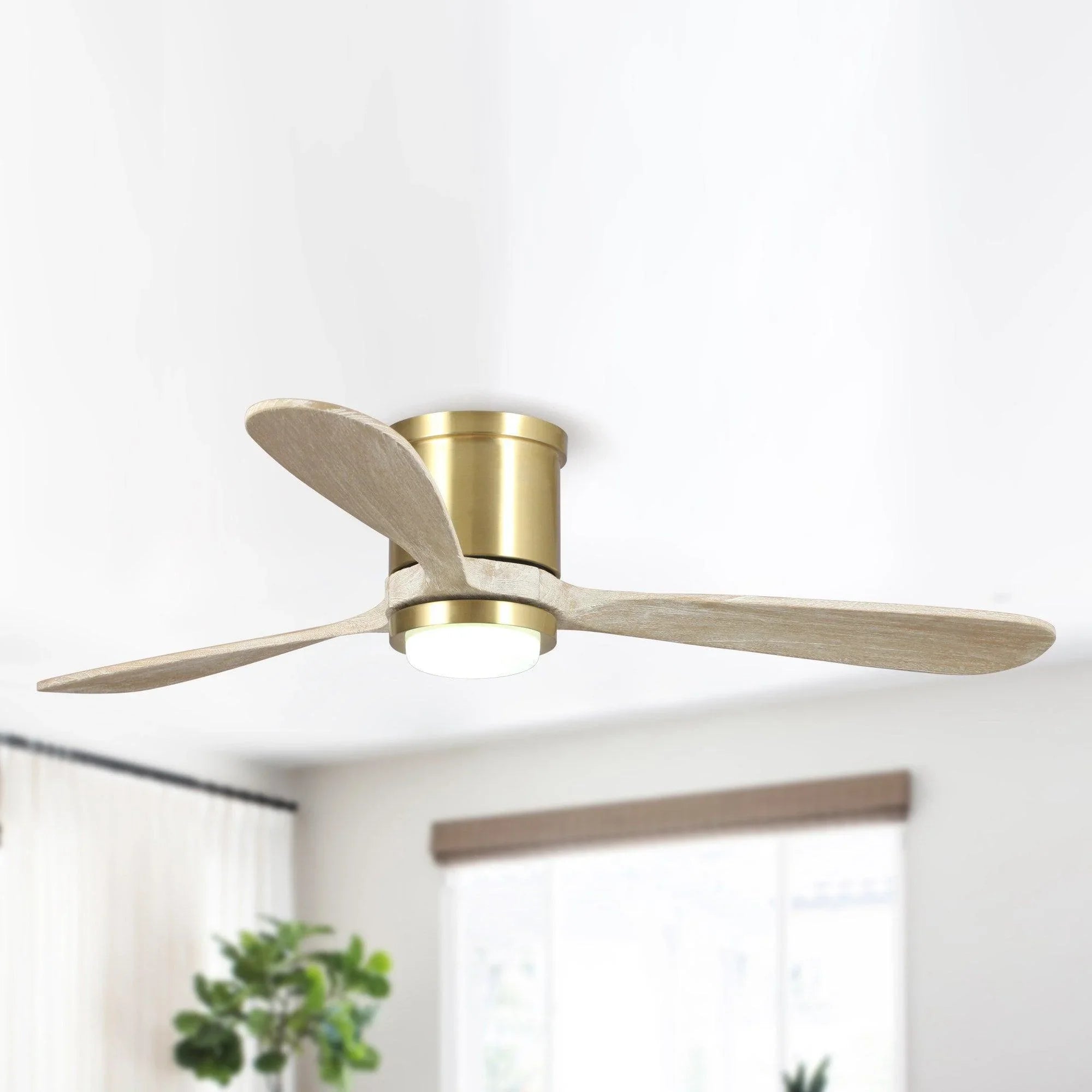 Golden smart ceiling fan with three wood-style blades and integrated LED light