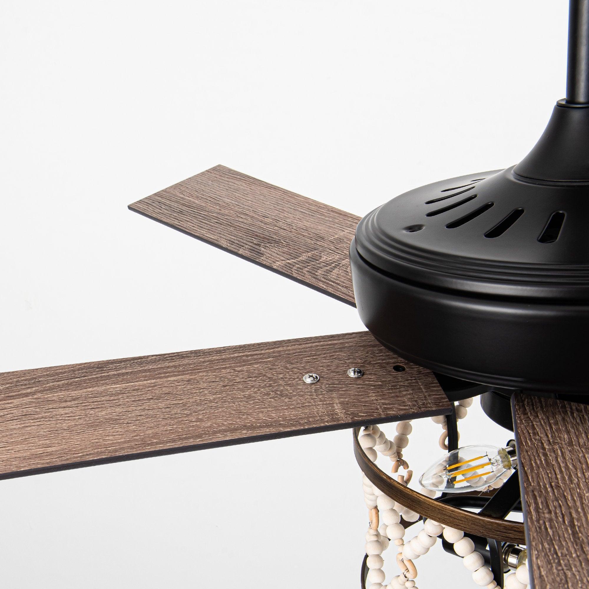 Reversible ceiling fan blade and black light fixture with bead strands