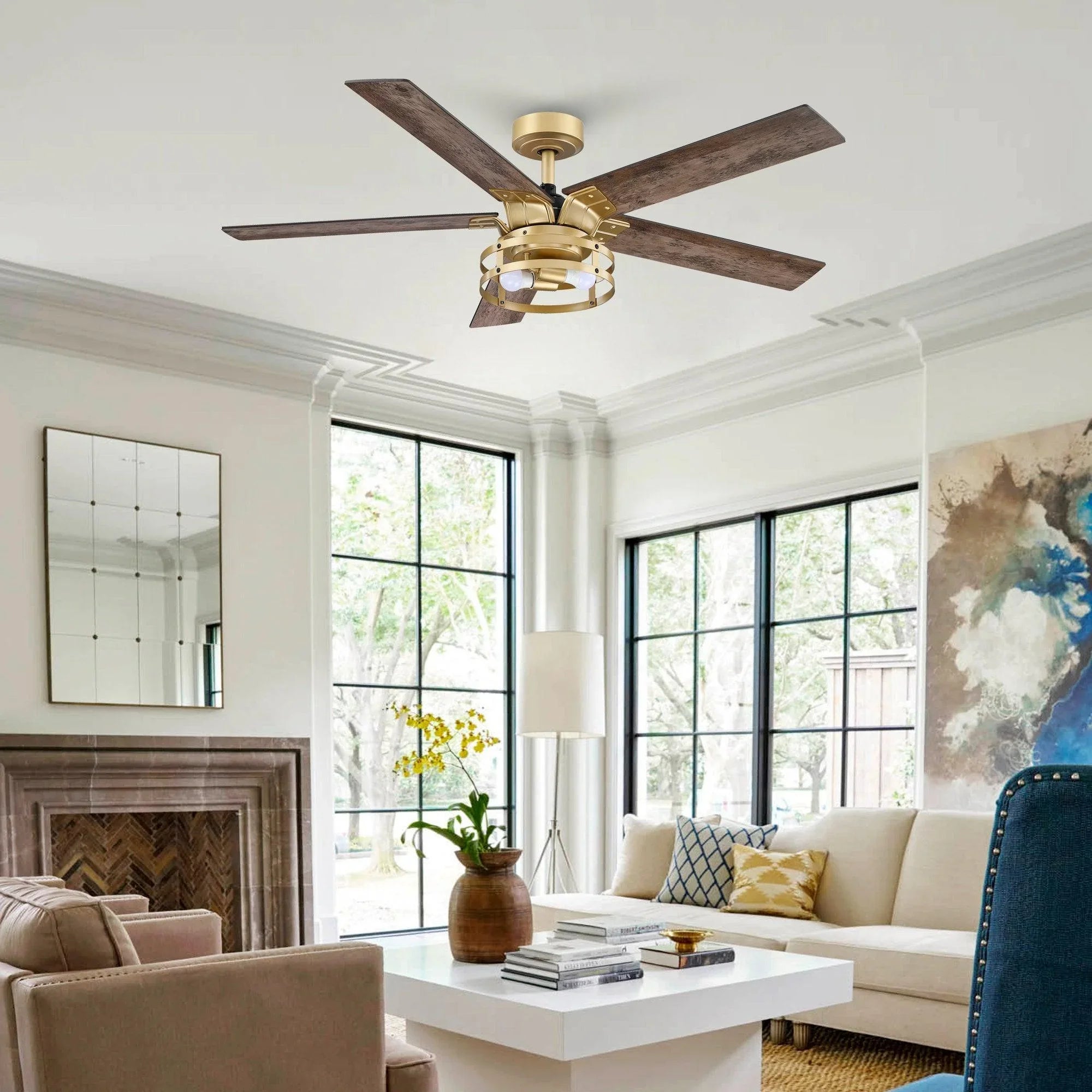 Industrial ceiling fan with light kit and four wood blades, downrod mount, golden finish.