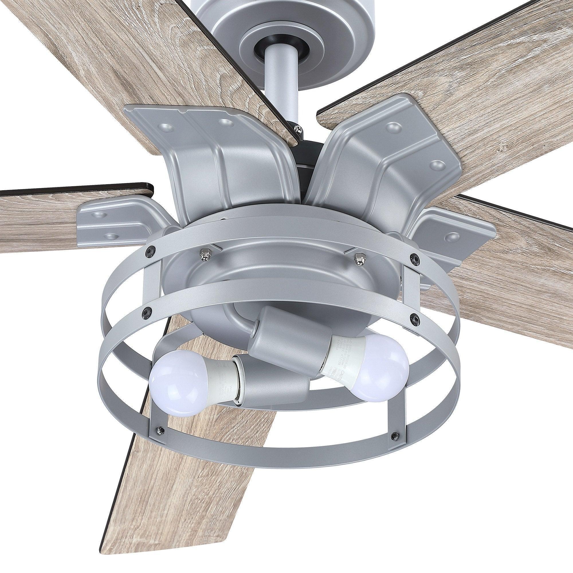 Ceiling fan motor housing with integrated light and light-gray reversible blades