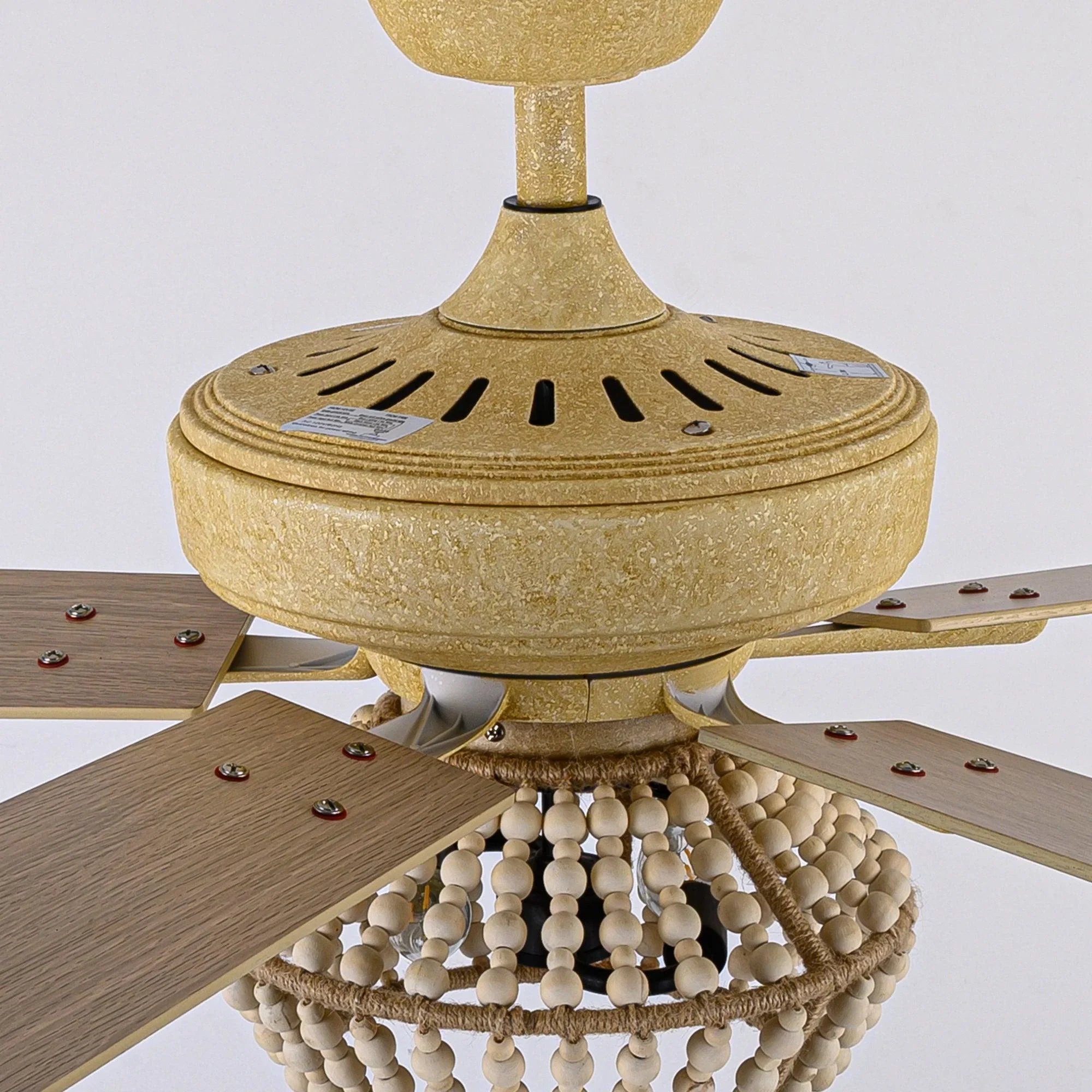 Ceiling fan motor housing with bead accents and blade mount hardware
