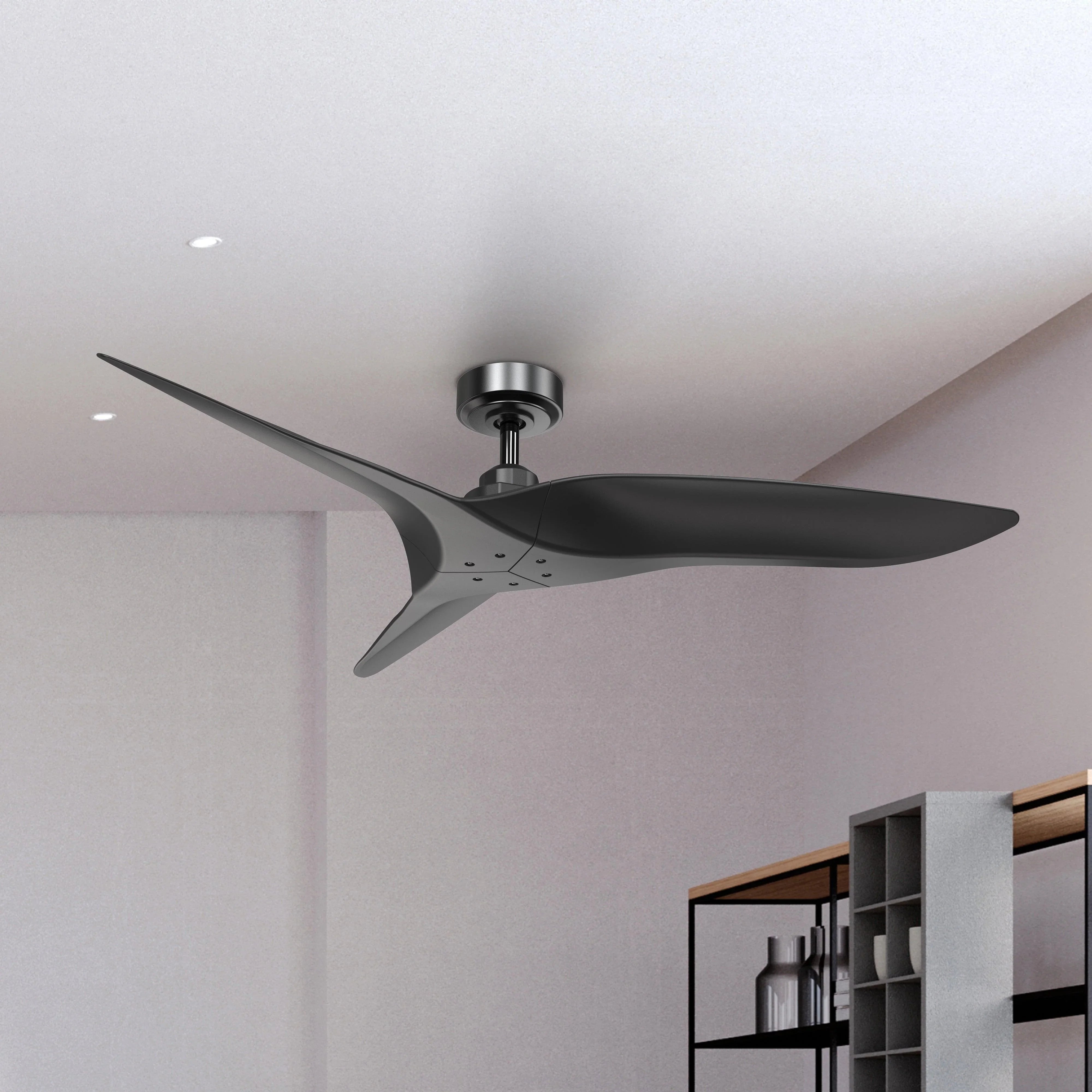 Black ceiling fan mounted on ceiling with five blades and circular motor housing