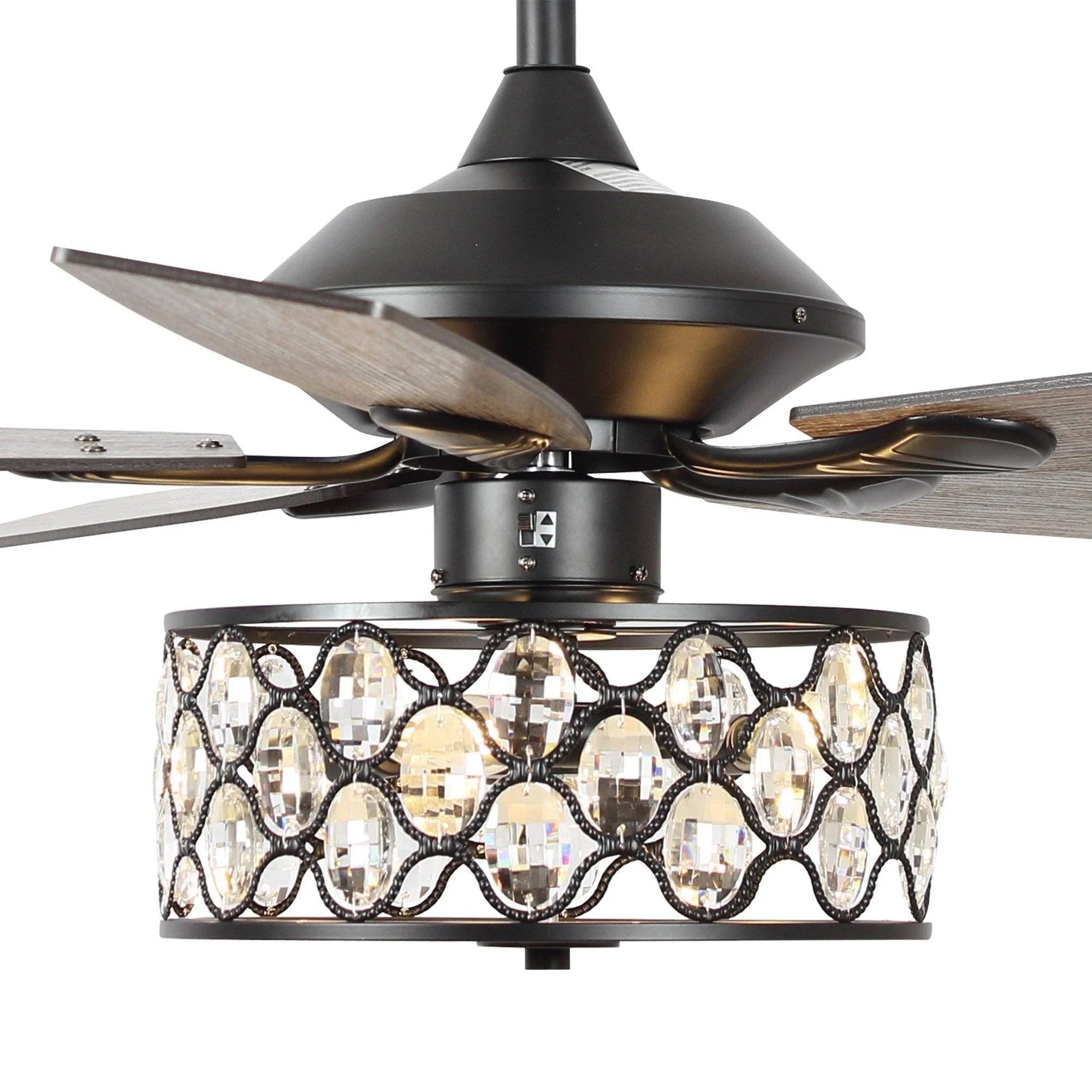 Black ceiling fan with wood-finish reversible blades and crystal glass light shade