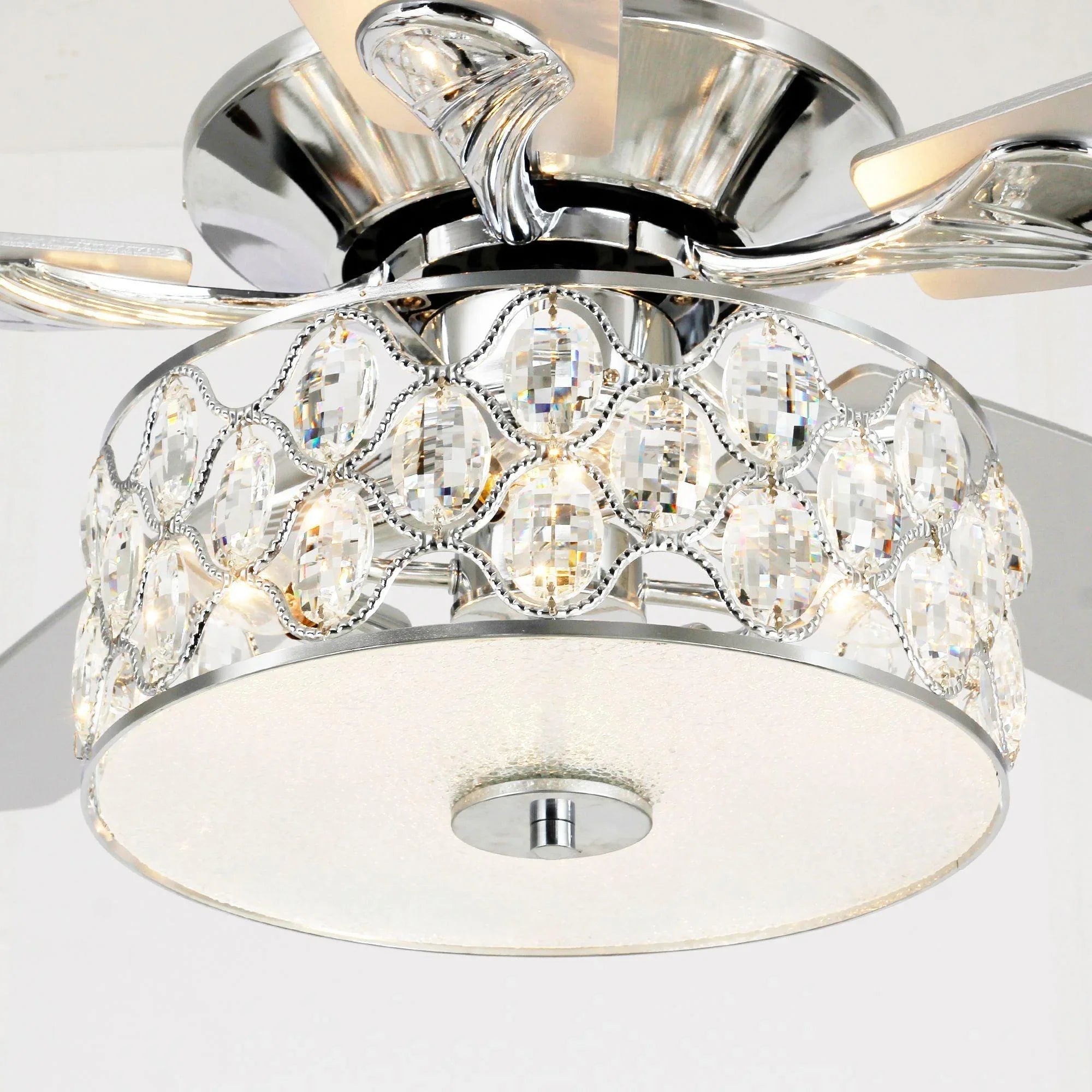Close-up of a chrome ceiling fan crystal lamp shade with integrated light