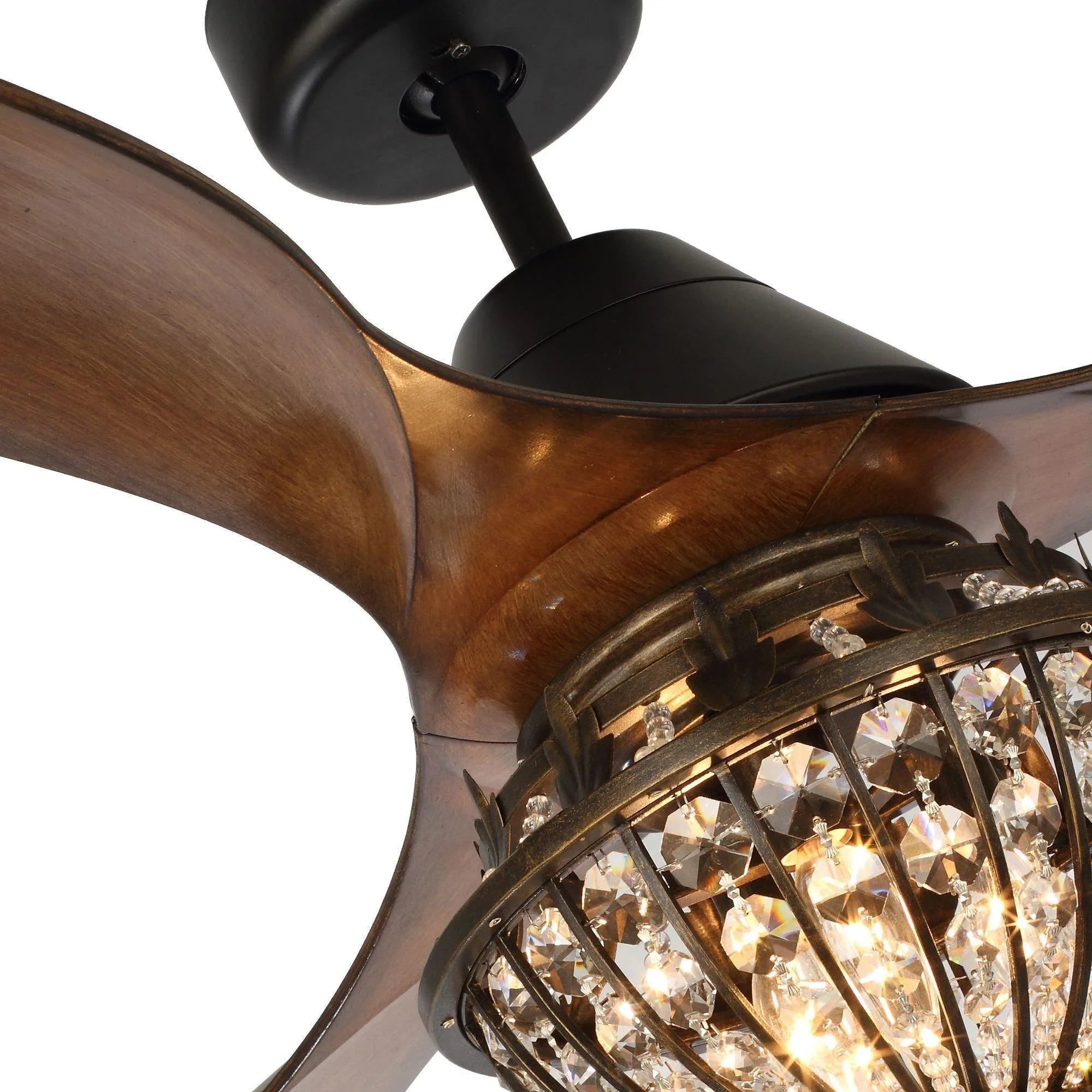 Black ceiling fan housing with brown blade and glowing crystal glass light rim