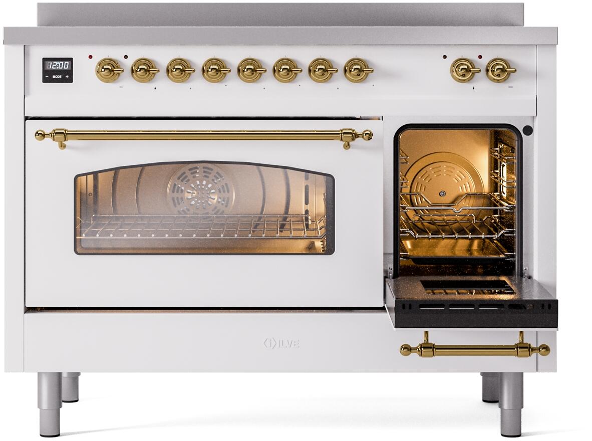 White range with one oven door open; brass trim and lit interior display