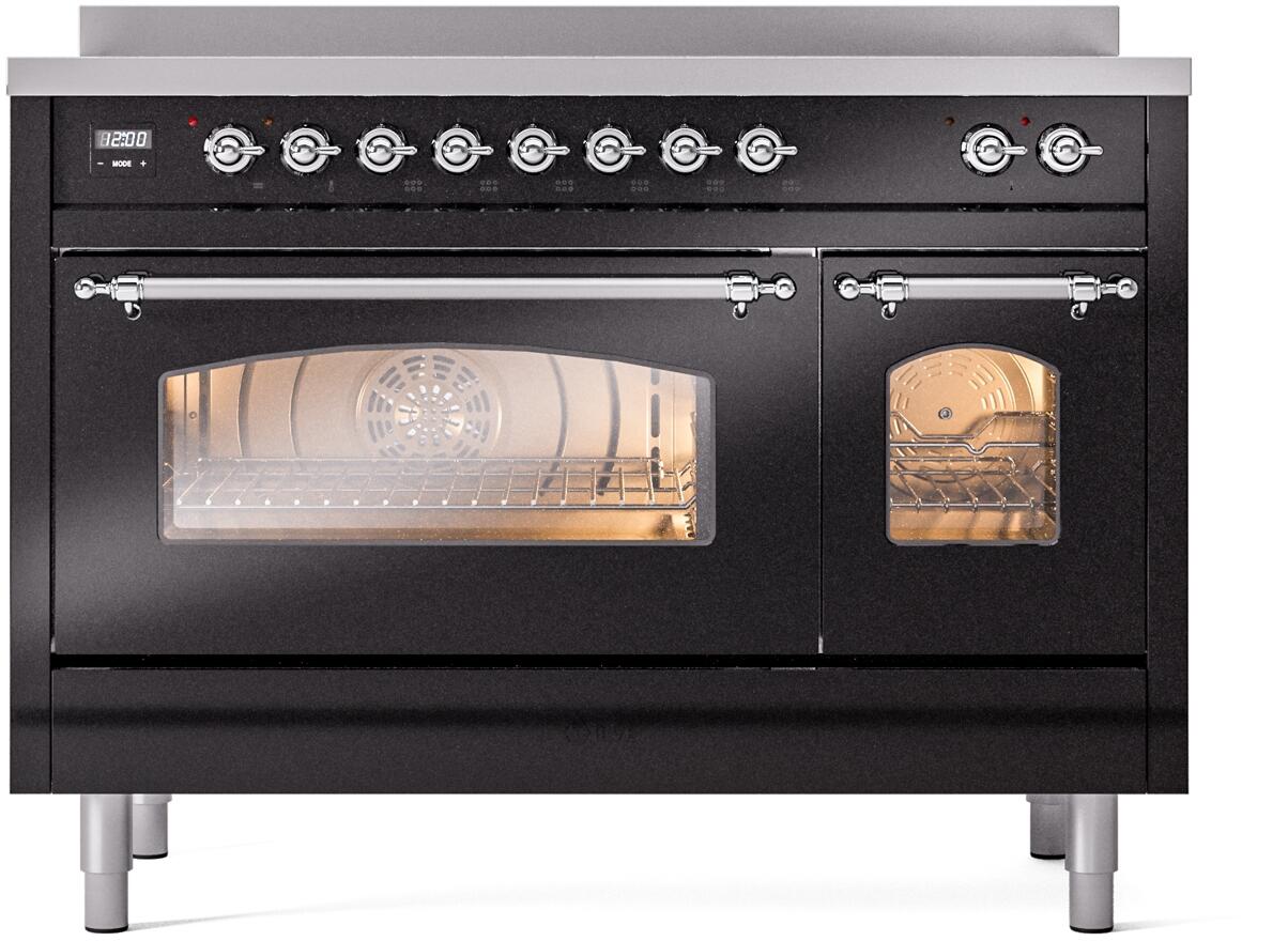 Freestanding induction range front with oven door open and interior light on