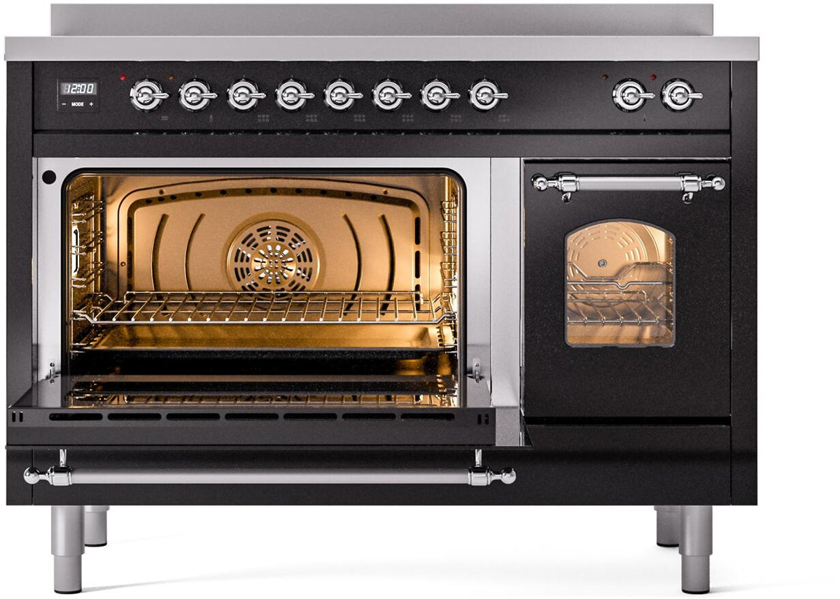 Freestanding induction range with oven door open, lit cavity with racks and fan vent