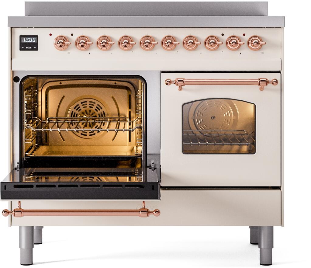 Freestanding induction range, one oven door open with racks visible, antique white and copper trim