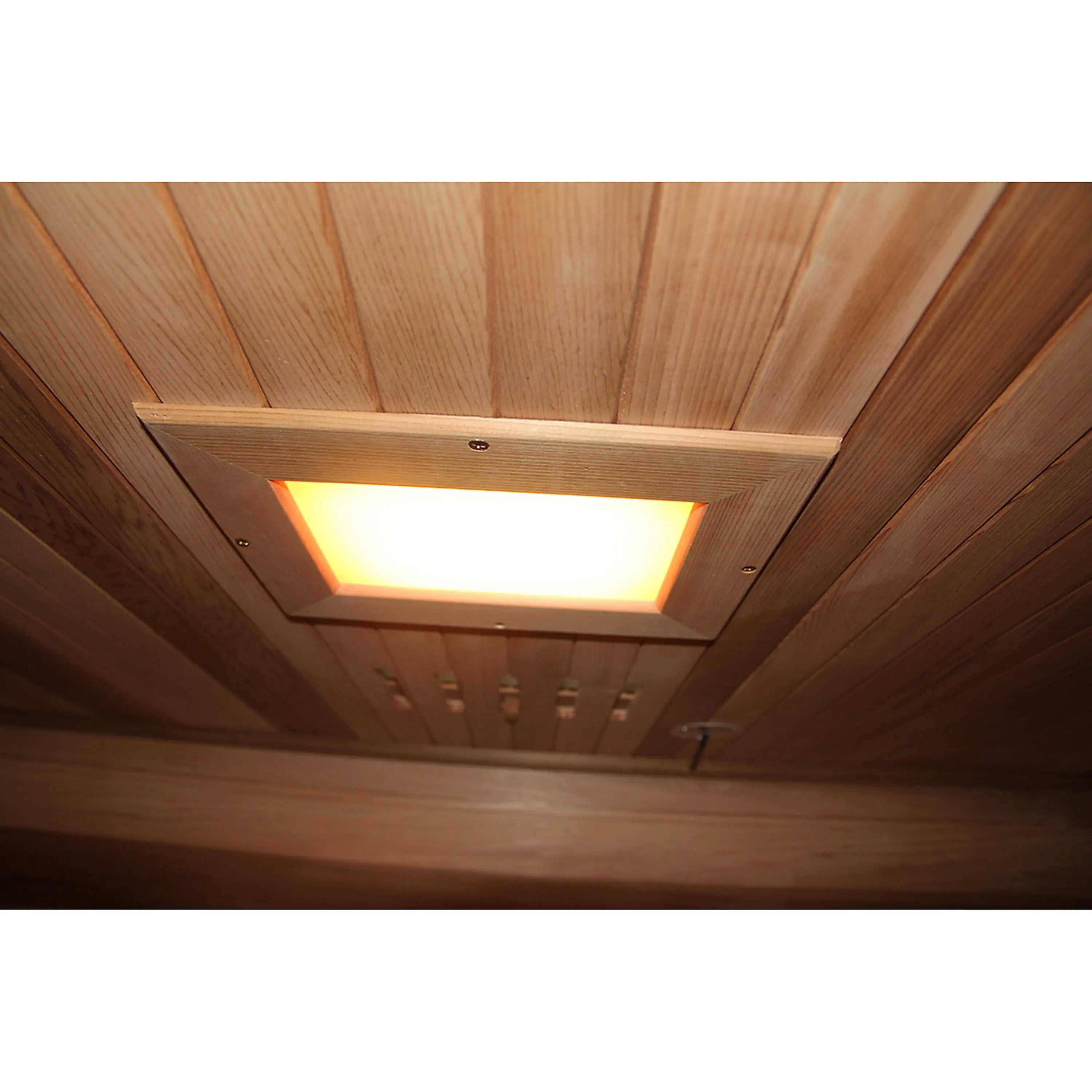Infrared sauna ceiling LED light panel with warm glow, wood slats overhead