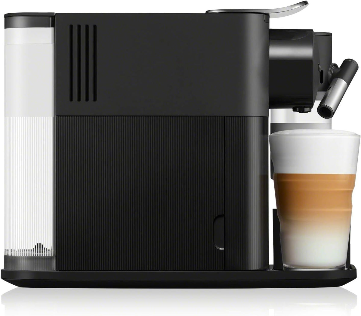 Black Nespresso espresso machine with built-in milk spout and cup on tray