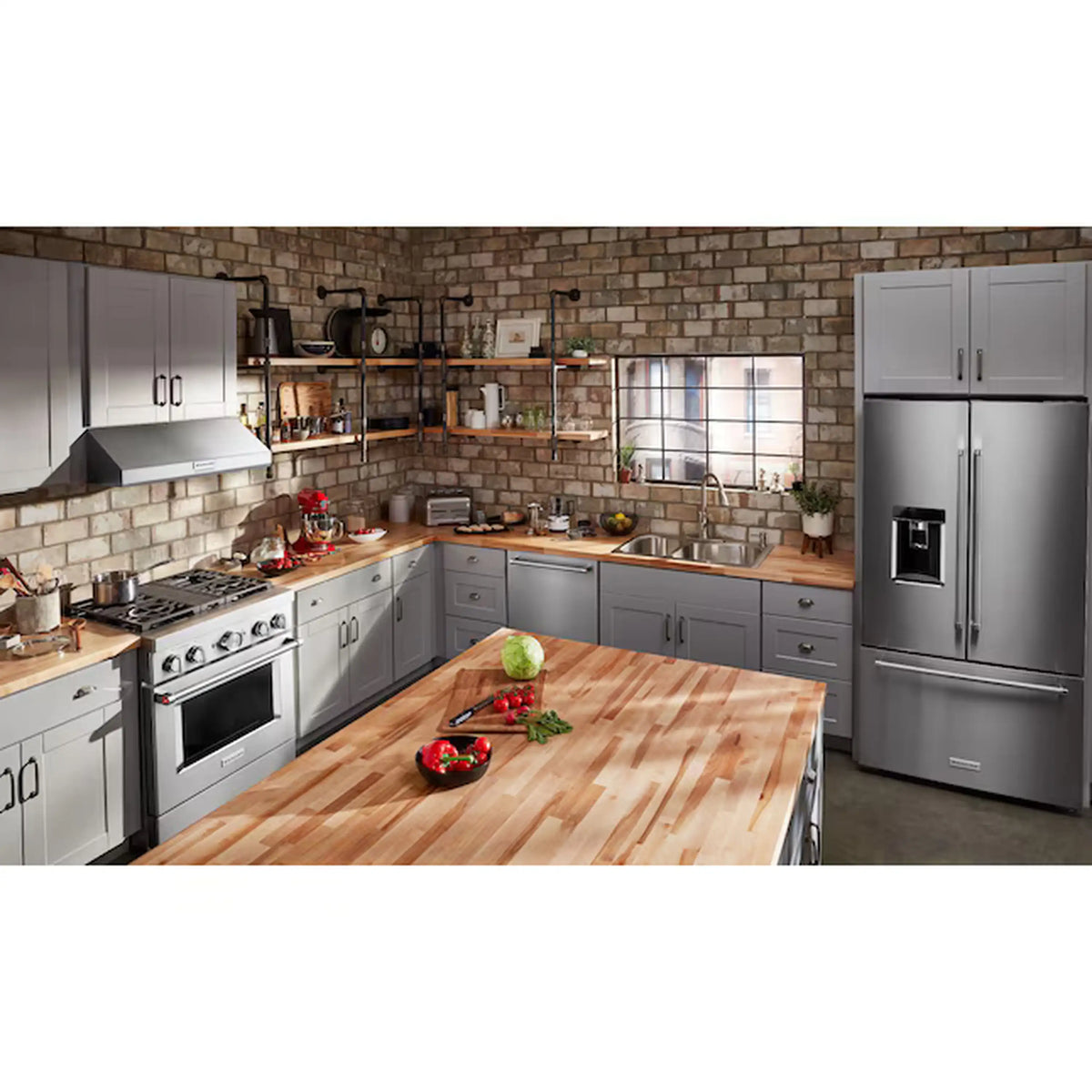 Kitchen countertop scene with a Contour Silver KitchenAid 4-slice toaster in the foreground