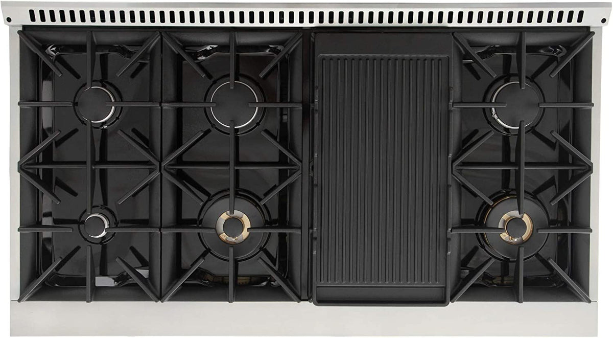 Open cooktop with black burner grates and center burner compartment in Kucht range.