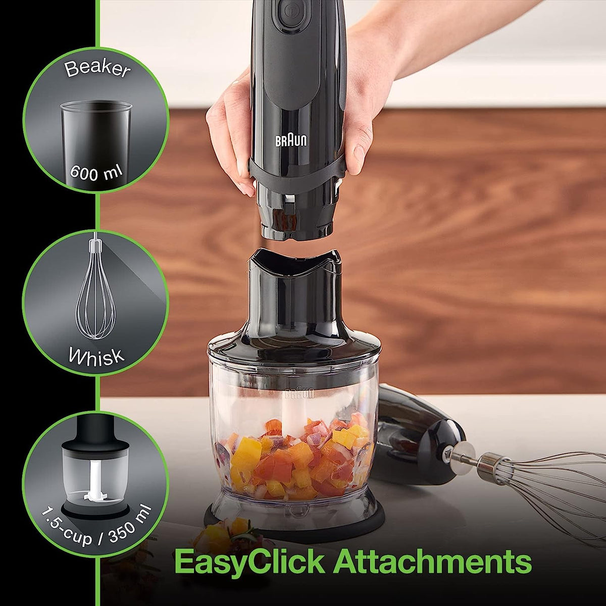 Immersion blender attachment in a clear cup, blending diced ingredients with whisk