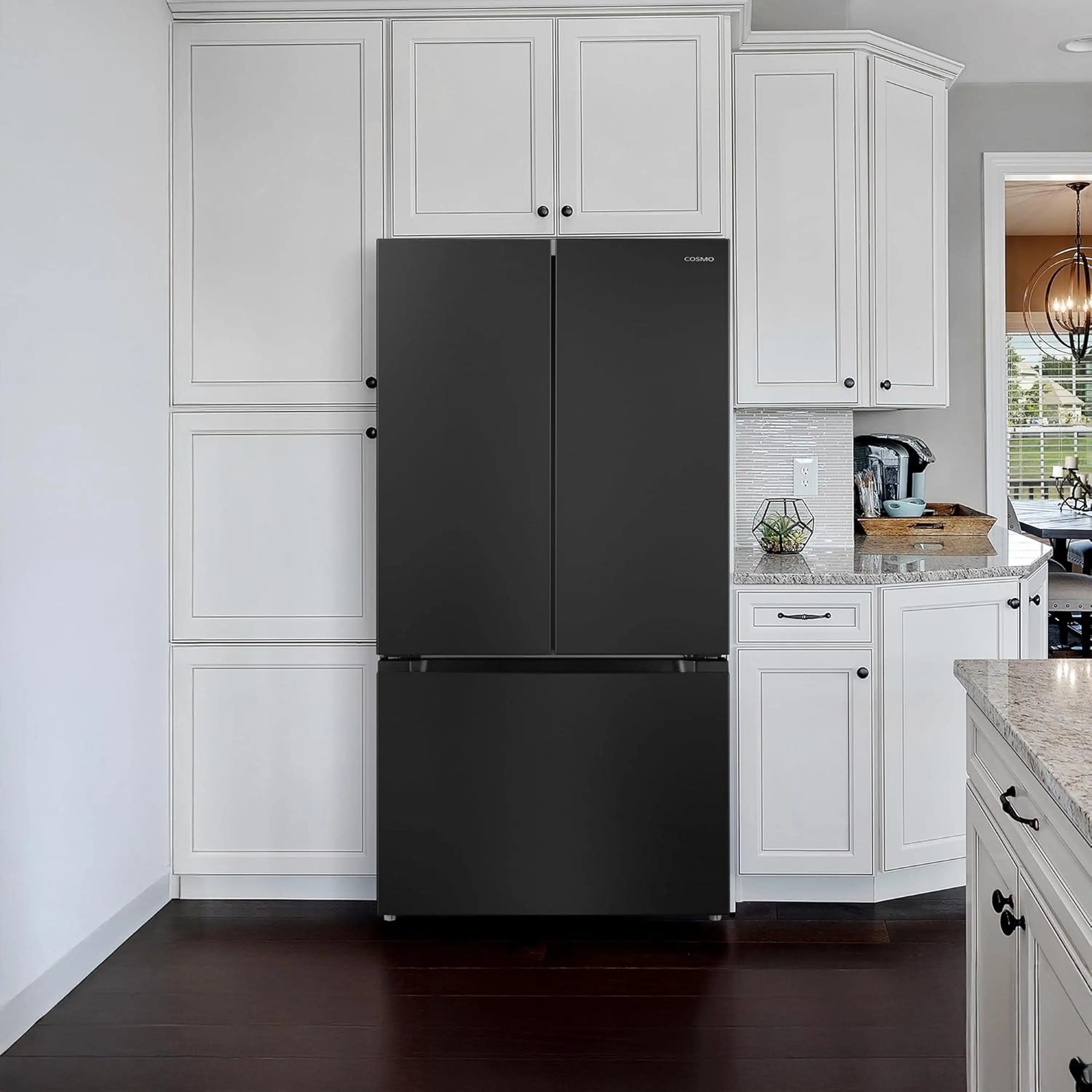 Matte black French door refrigerator in kitchen with white cabinetry