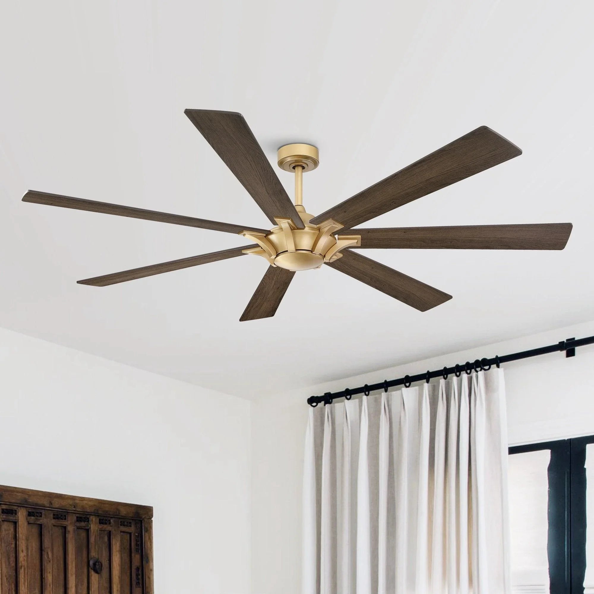 Golden ceiling fan with five wood blades and decorative motor housing