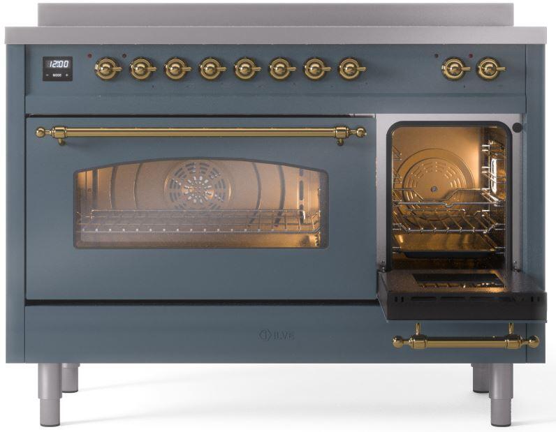 Blue-grey induction range with oven door ajar showing lit interior and brass handle