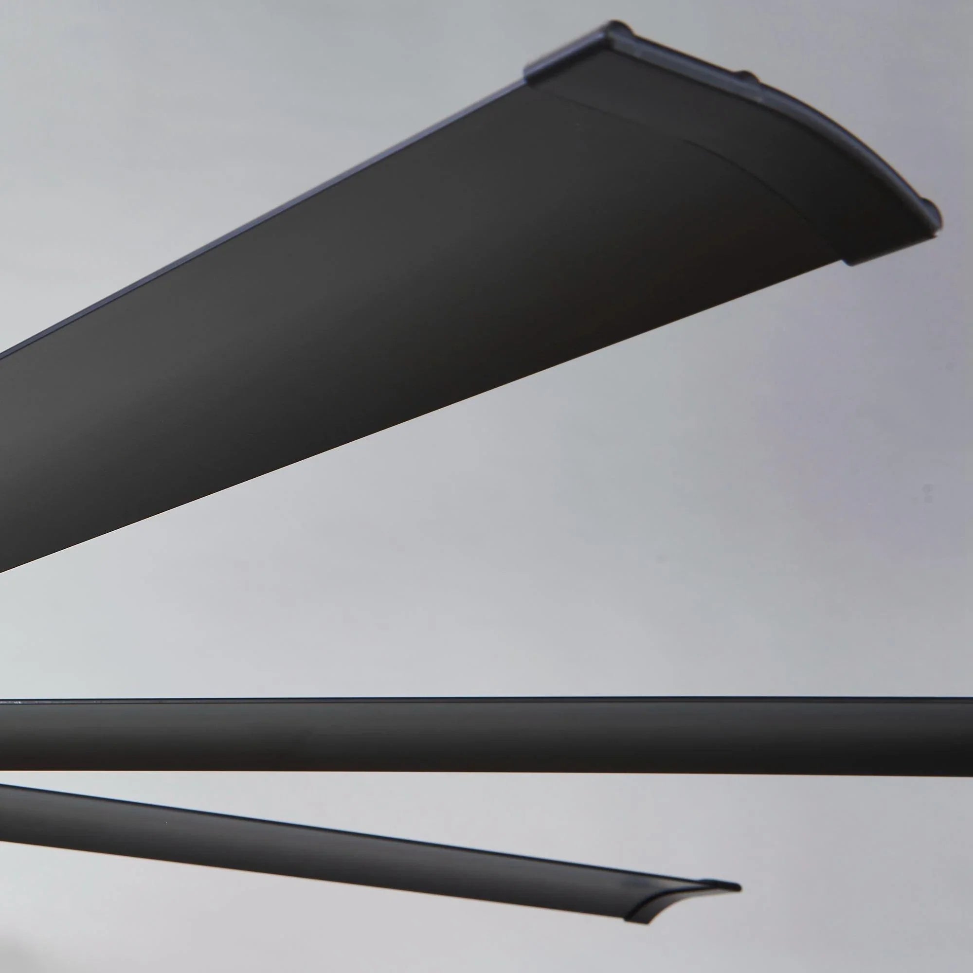 Black ceiling fan blade arm with smooth metal finish
