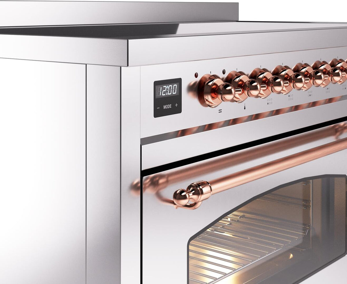 Stainless induction range control panel with copper-trim knobs and bar handles