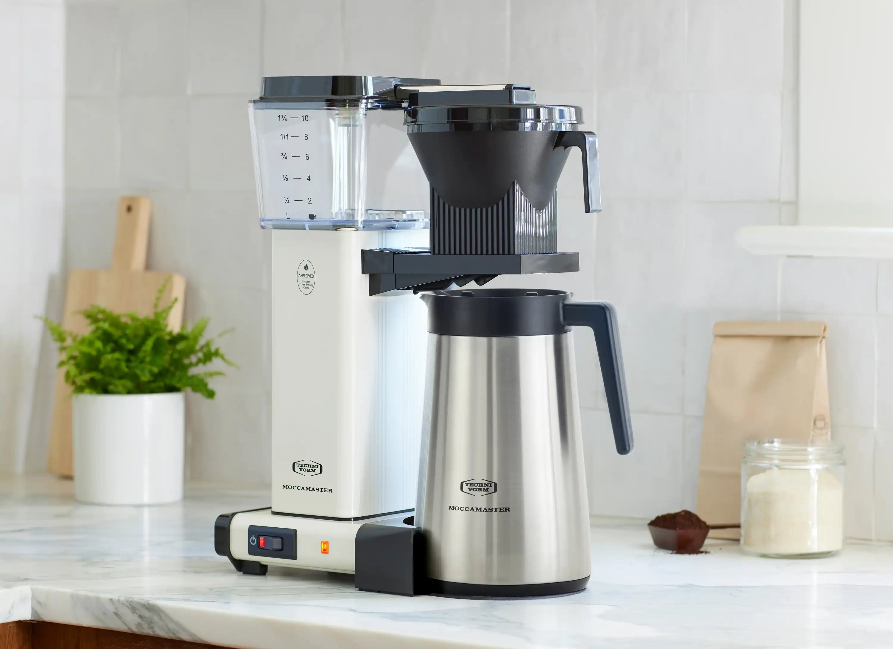 Moccamaster off-white coffee maker with drip-stop and stainless thermal carafe