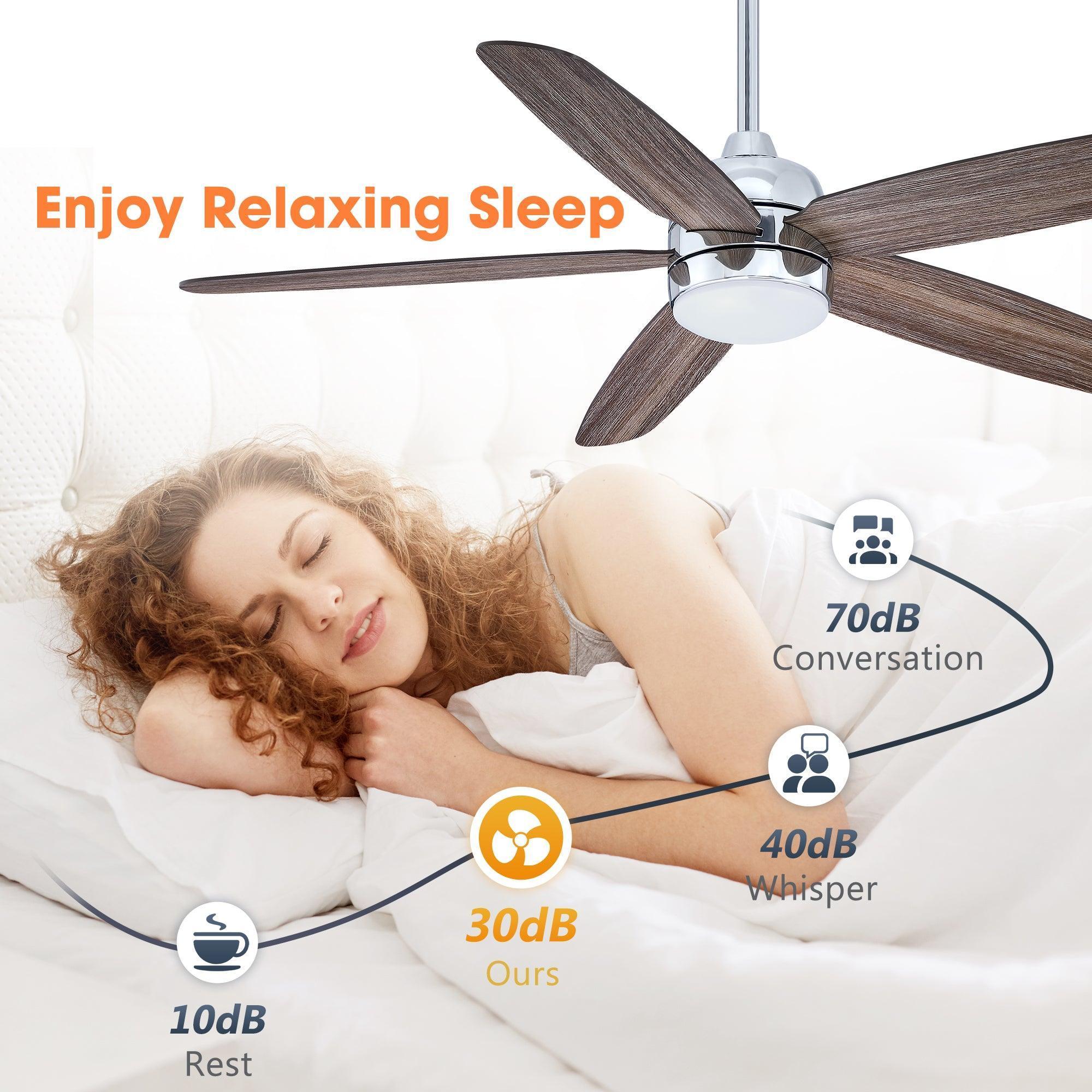Farmhouse ceiling fan with chrome downrod, dark wood blades, and soft ambient light