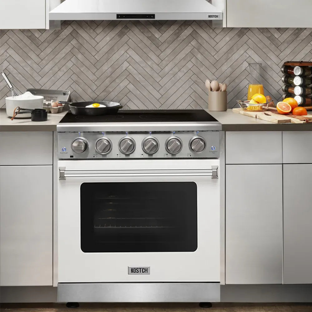 White electric range with black glass cooktop, oven door window, and front control knobs