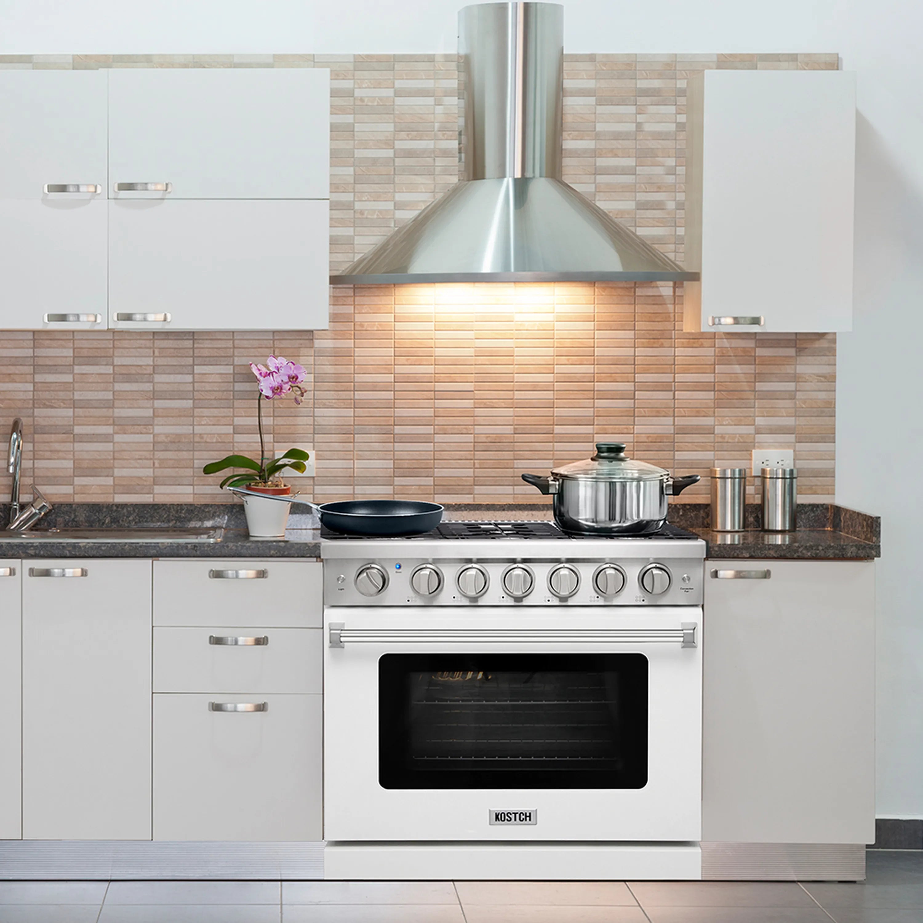 White 36-inch gas range with six burners and convection oven in a modern kitchen