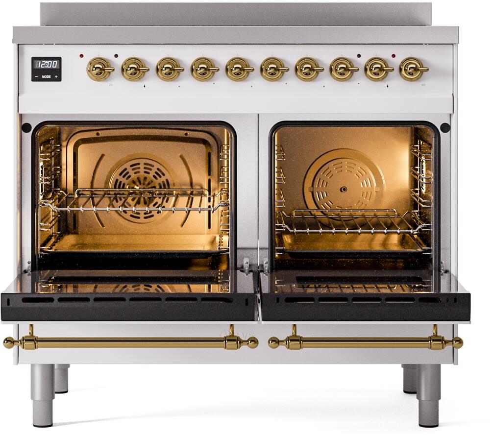 Freestanding induction range with two open ovens and brass door handles, showing racks