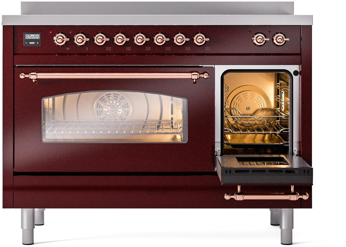 Freestanding electric induction range, open oven door with illuminated interior, burgundy