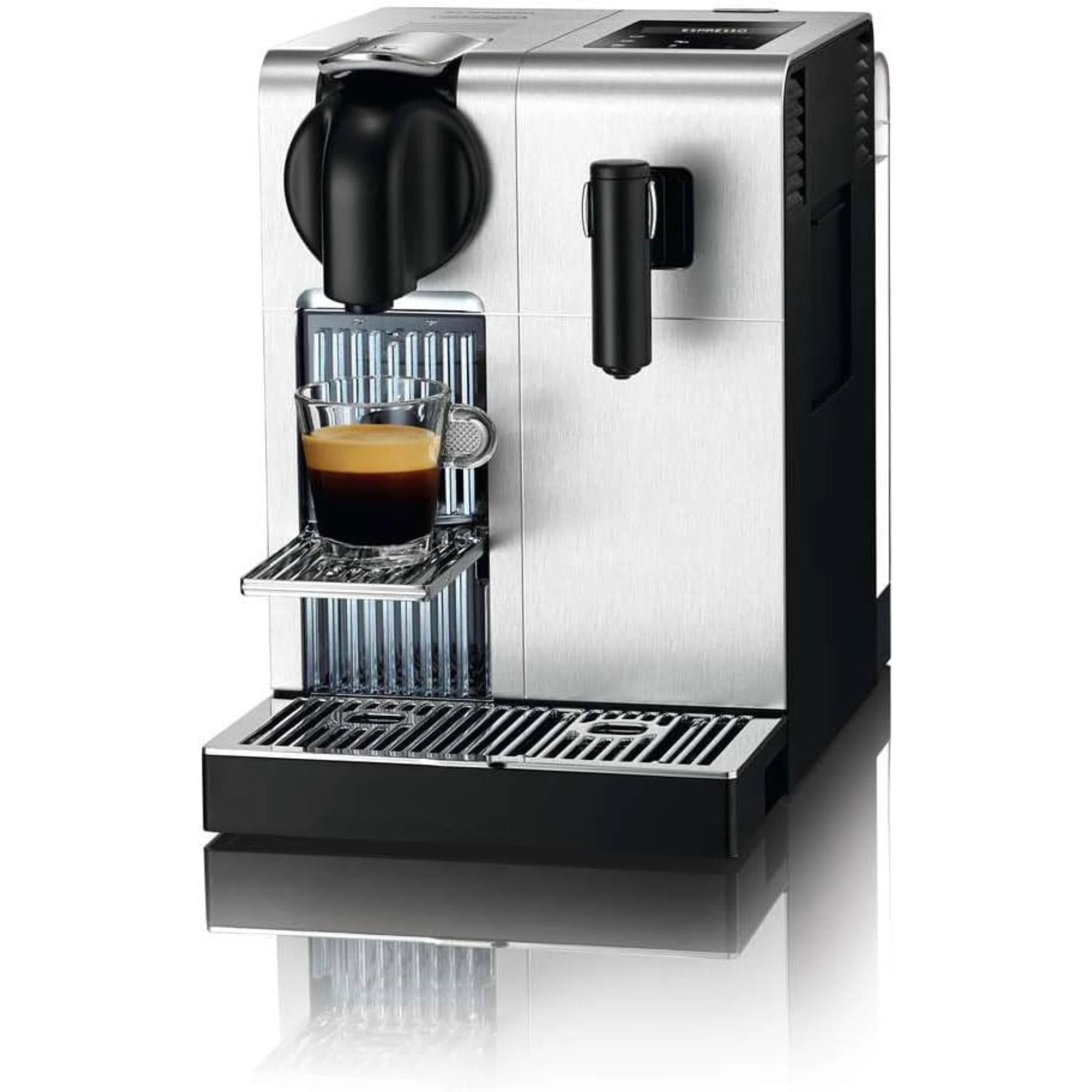Espresso and cappuccino machine dispensing into cup with froth, brushed aluminum and black