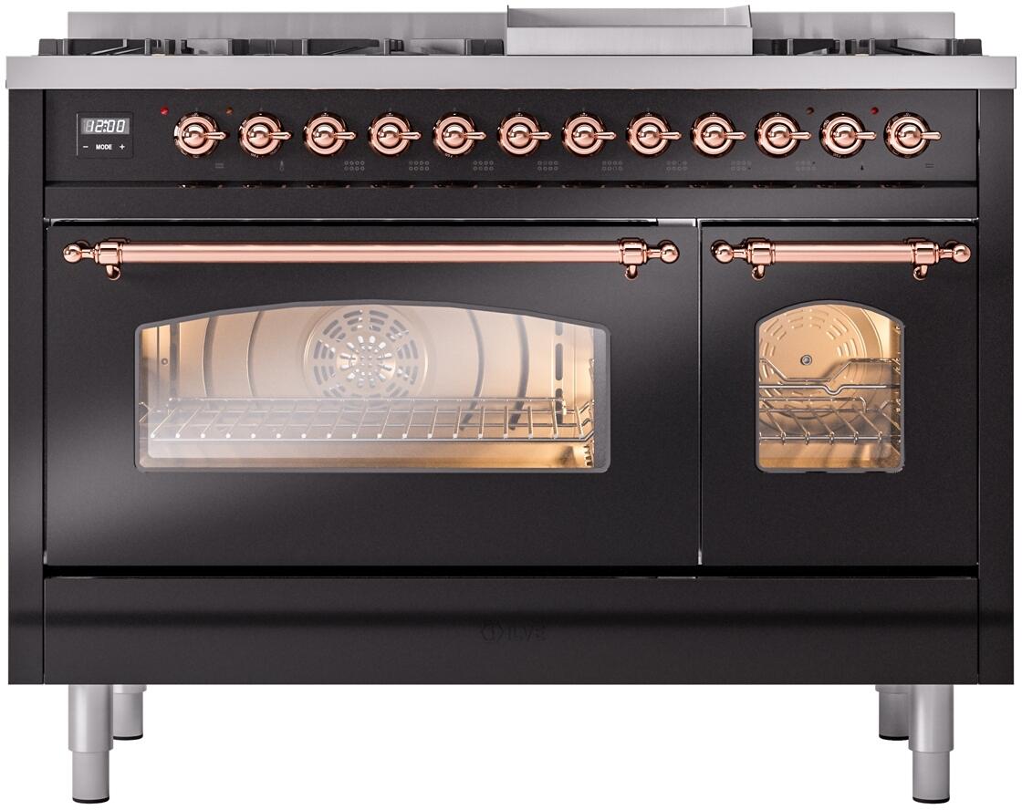 Black dual-fuel range front with illuminated oven window and copper control knobs