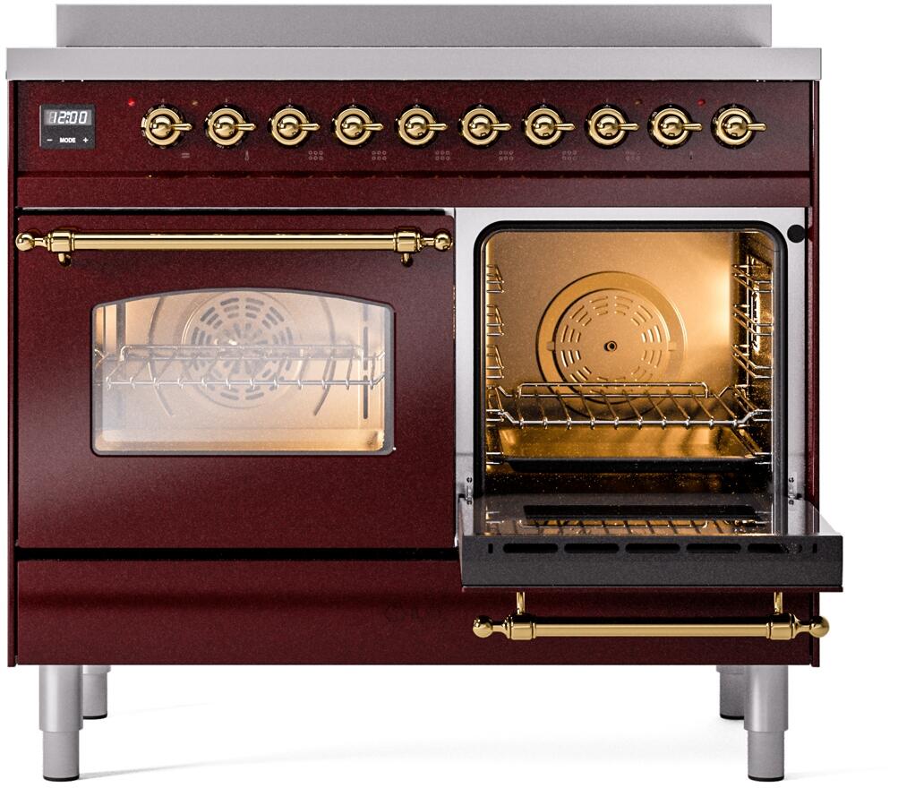 Burgundy electric induction range with brass handles and one oven window in view