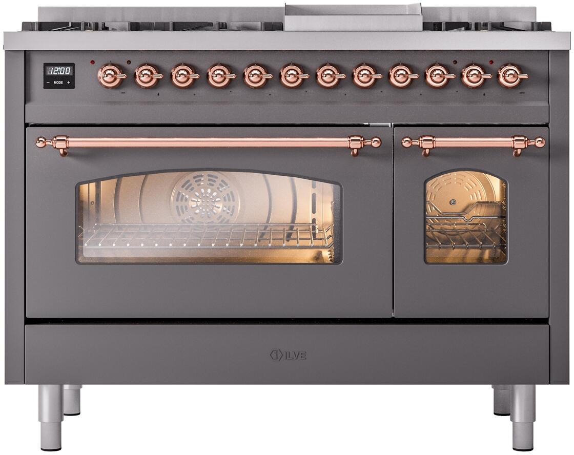 Matte graphite dual fuel range with copper-trimmed glass oven door and control knobs.