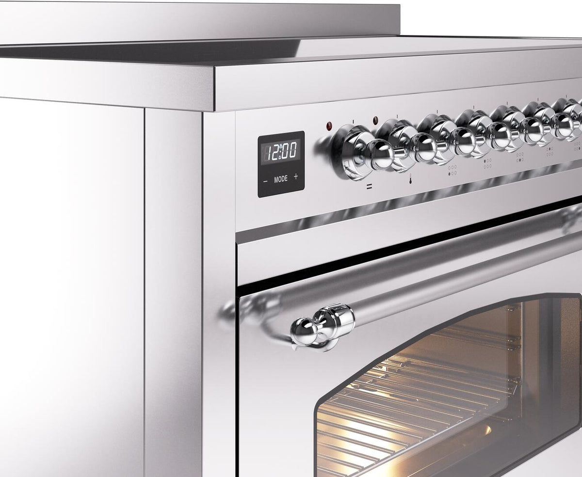 Stainless steel control panel with chrome knobs and digital display above oven window