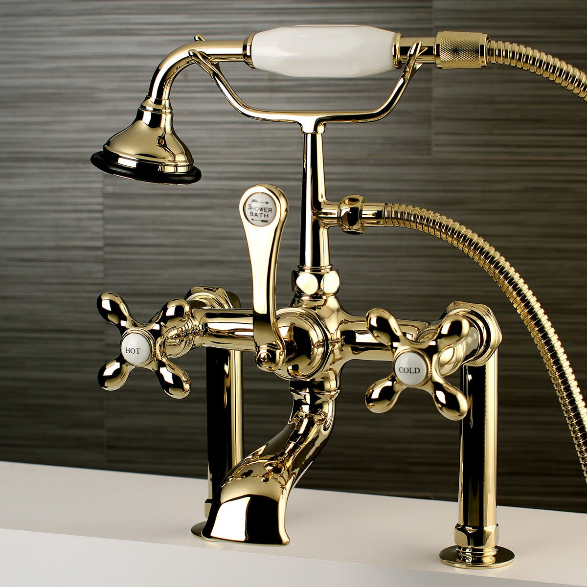 Aqua Vintage 7" Center Deck-Mount Clawfoot Tub Faucet with Hand Shower in Polished Brass
