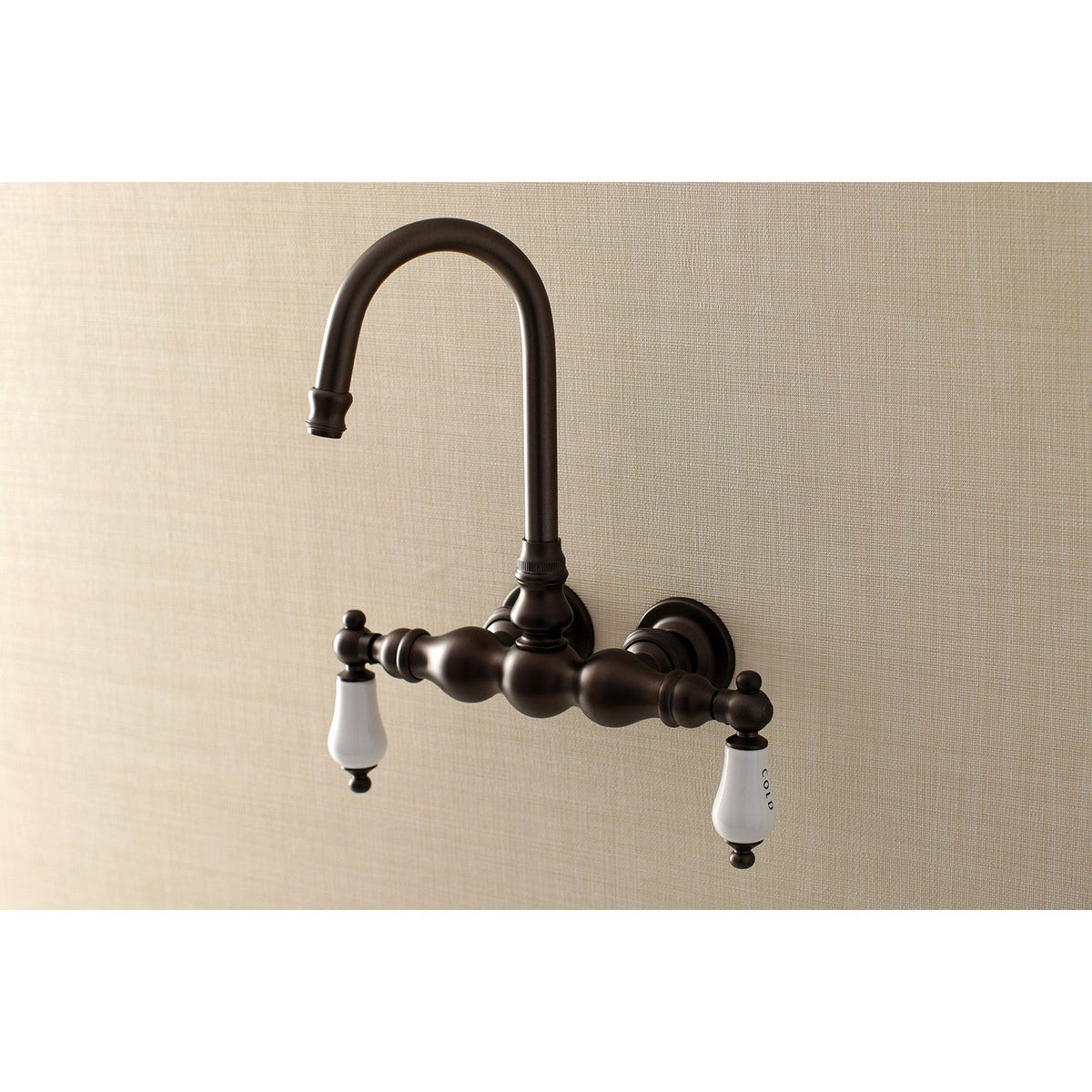 Aqua Vintage 3-3/8 Inch Wall Mount Tub Faucet in Oil Rubbed Bronze