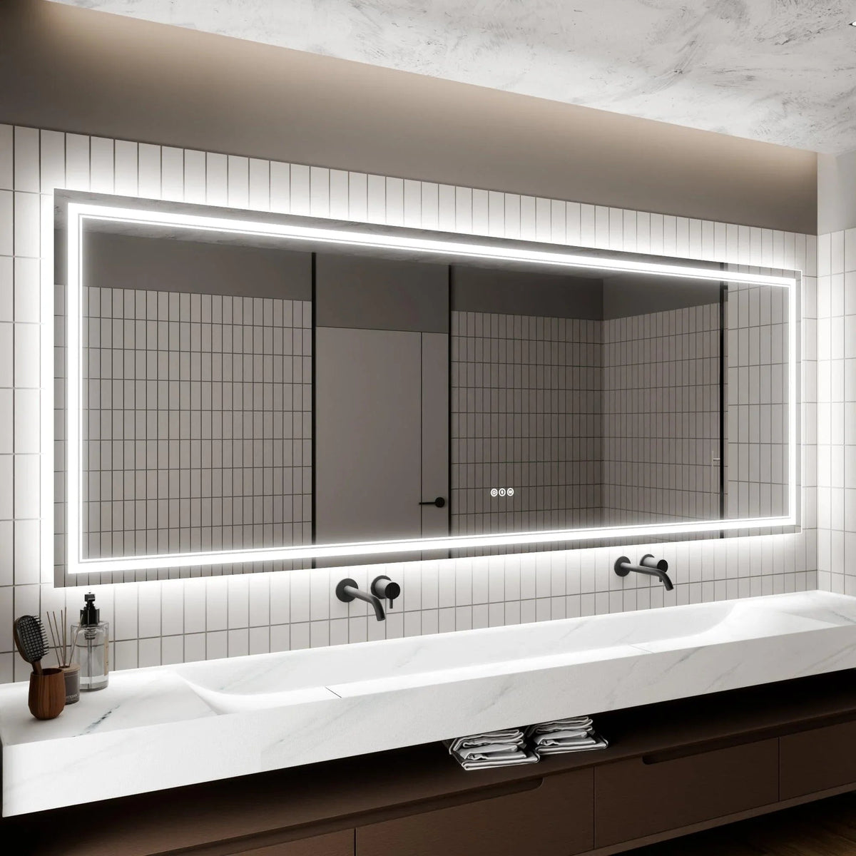 Backlit bathroom LED mirror with bright perimeter lighting above the bathtub.
