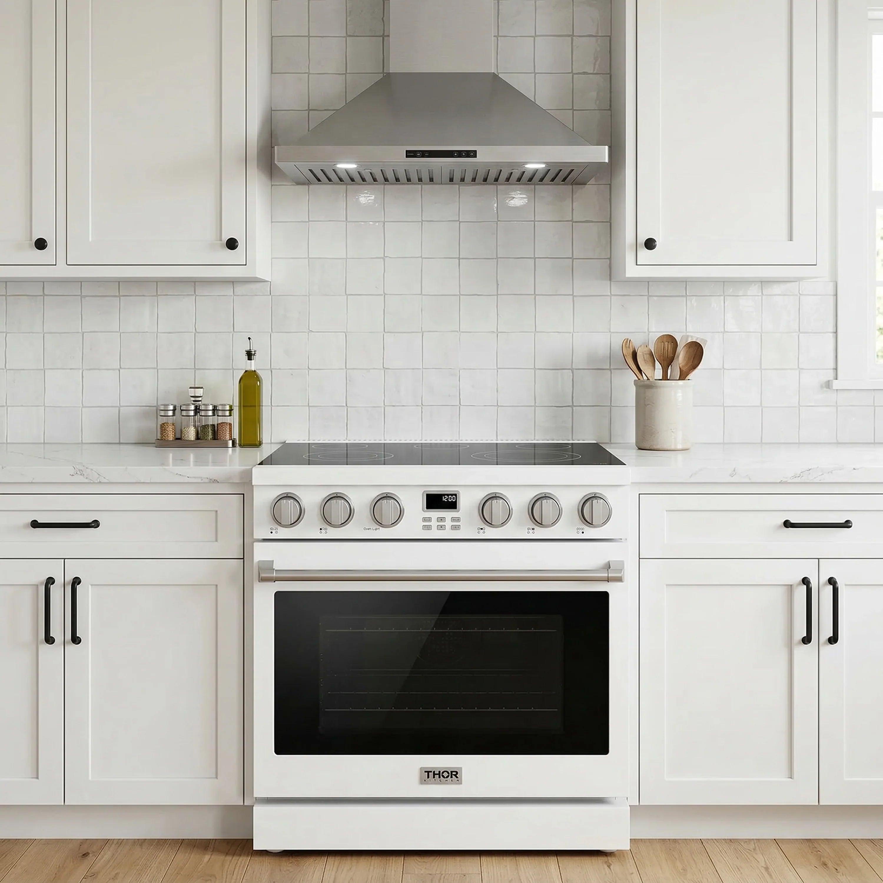 White electric range with oven door and overhead wall hood in a built-in kitchen