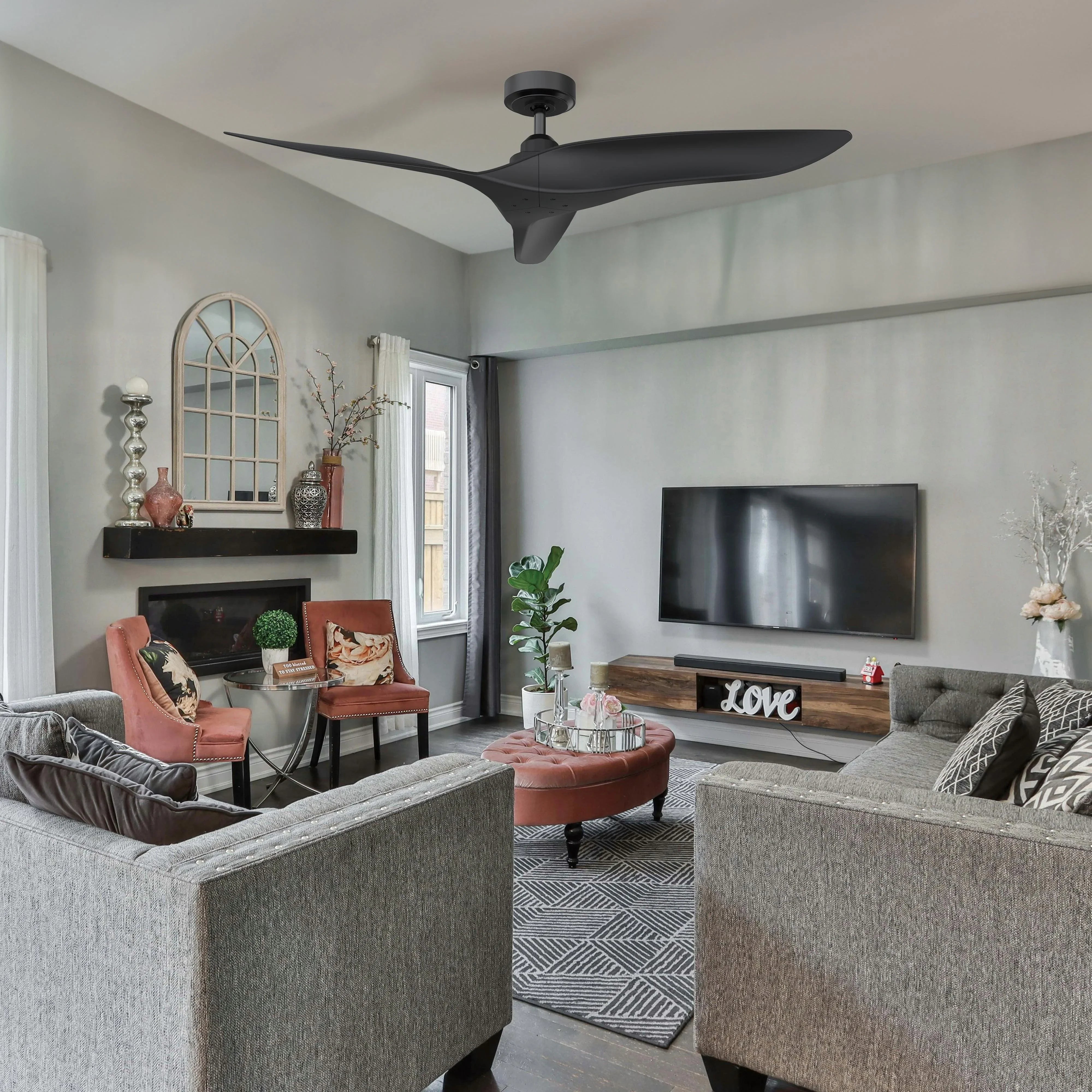 Ceiling fan with reversible blades, dark housing and blades