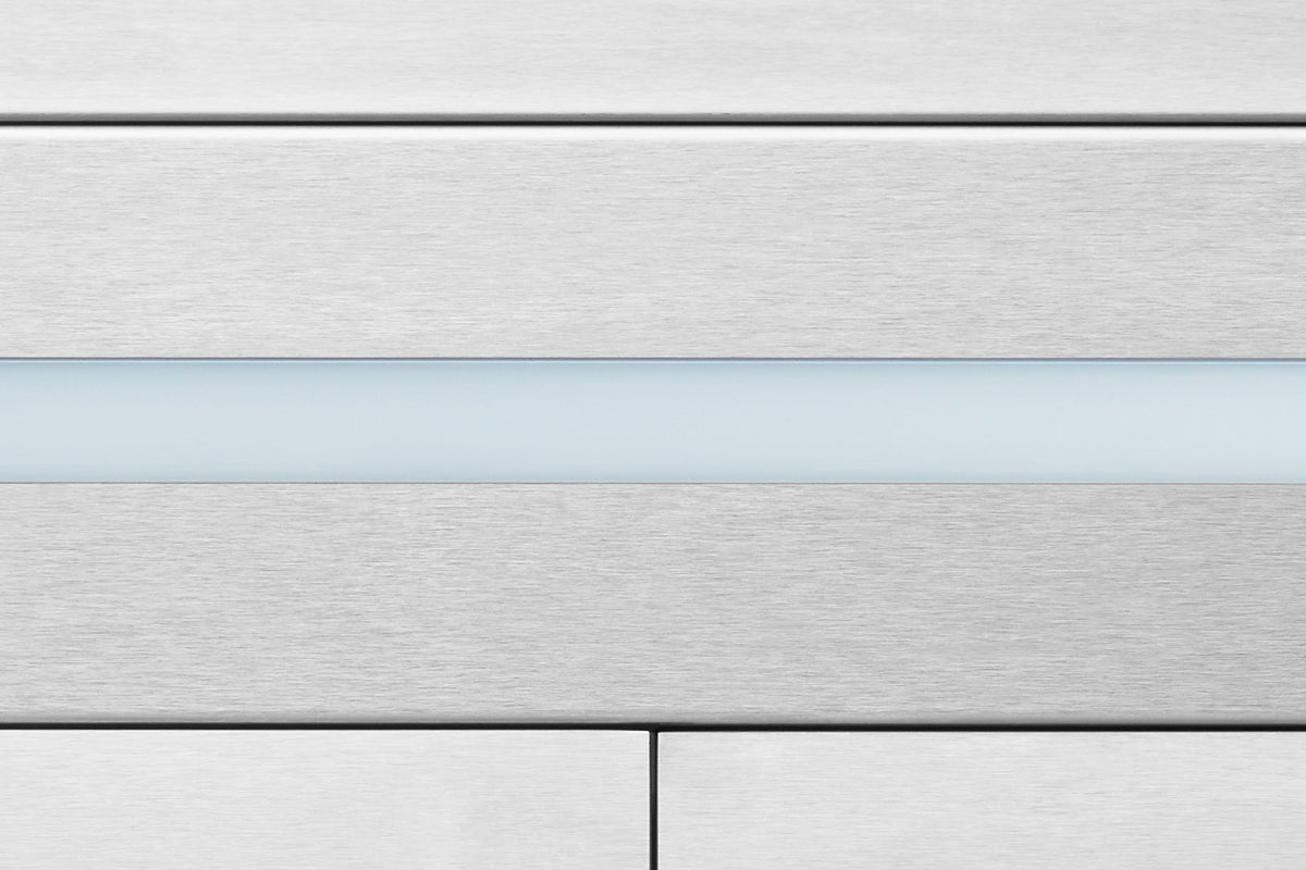 Stainless steel under-cabinet range hood top edge close-up with smooth finish