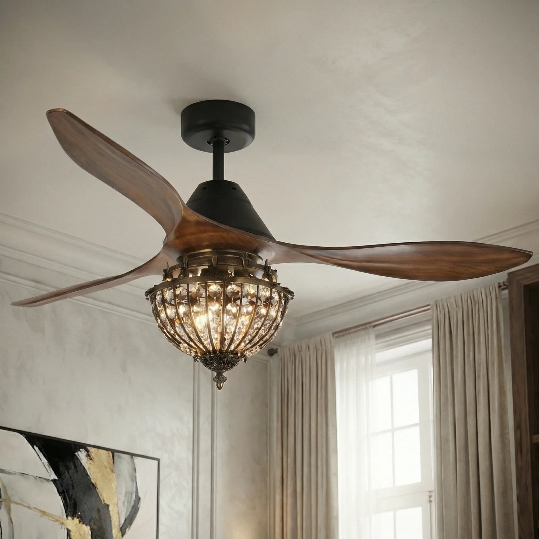 Black ceiling fan with three brown blades and a glass globe light fixture