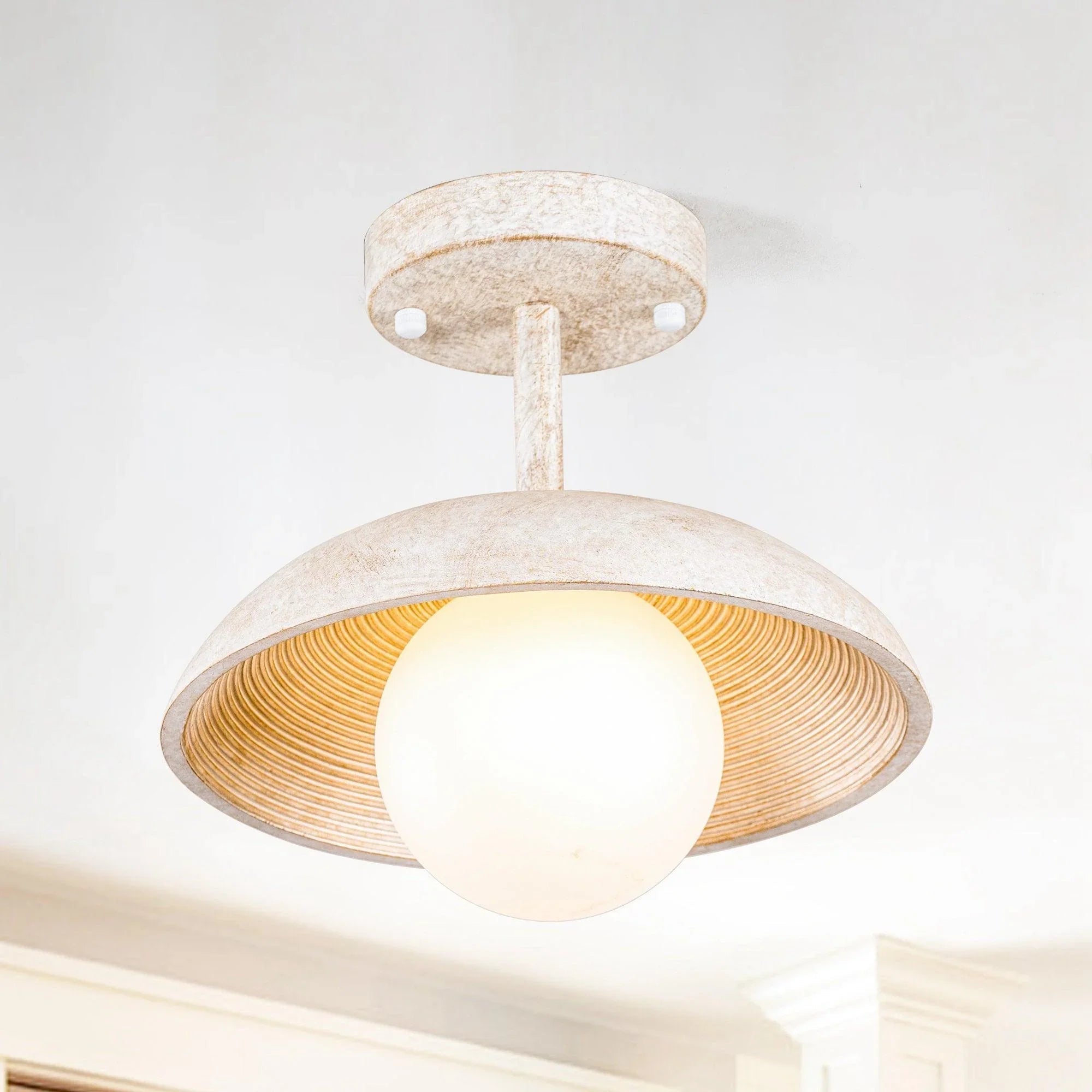 Farmhouse island pendant light featuring a ribbed metal shade and frosted globe