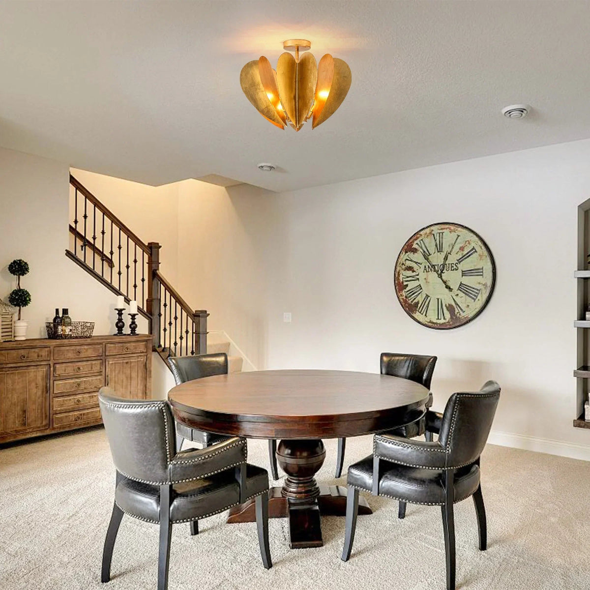 Golden petal-style semi-flush mount ceiling light with glowing candelabra bulbs