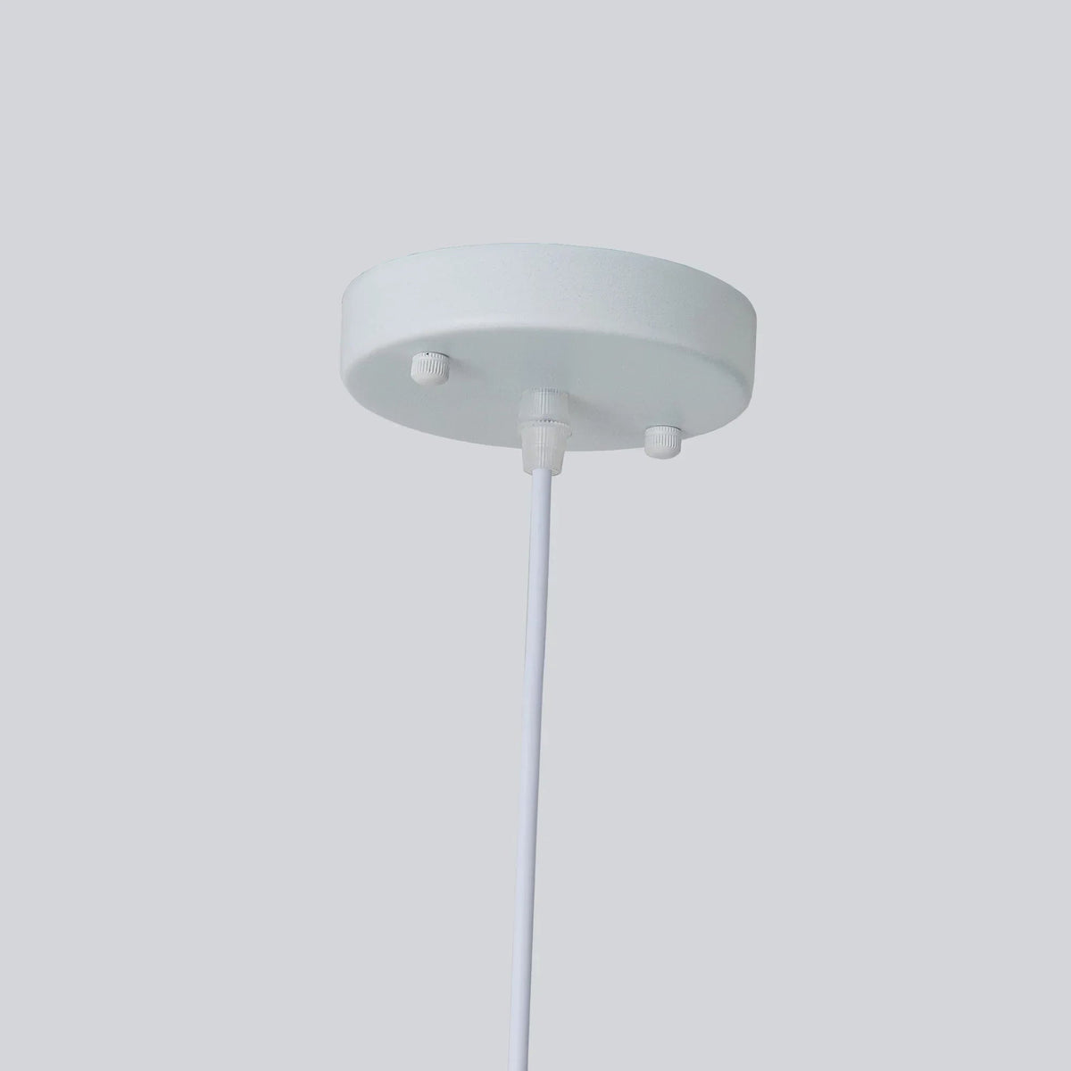 White pendant light canopy with vertical stem and mounting bracket