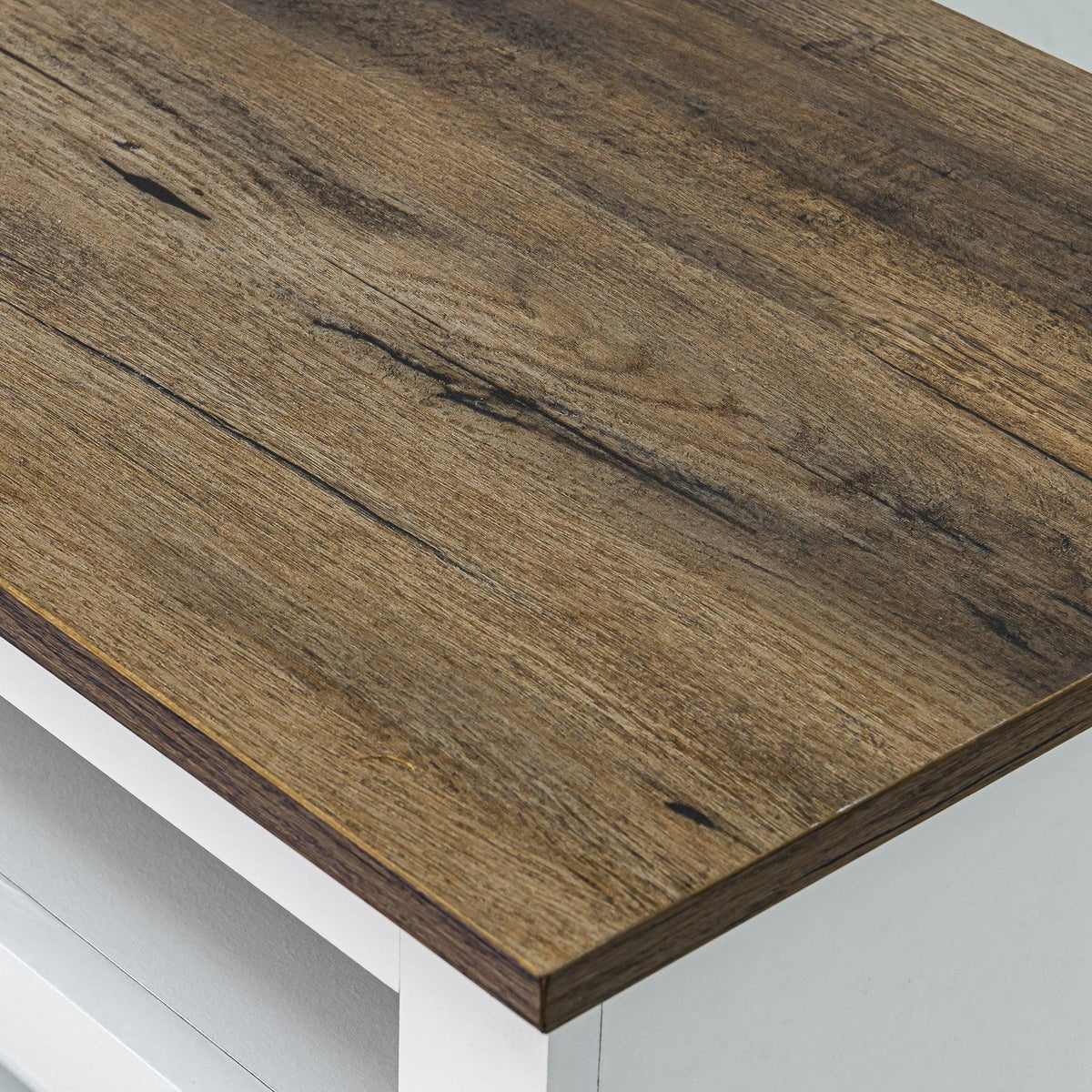 Brown wood tabletop with visible grain and distressed finish
