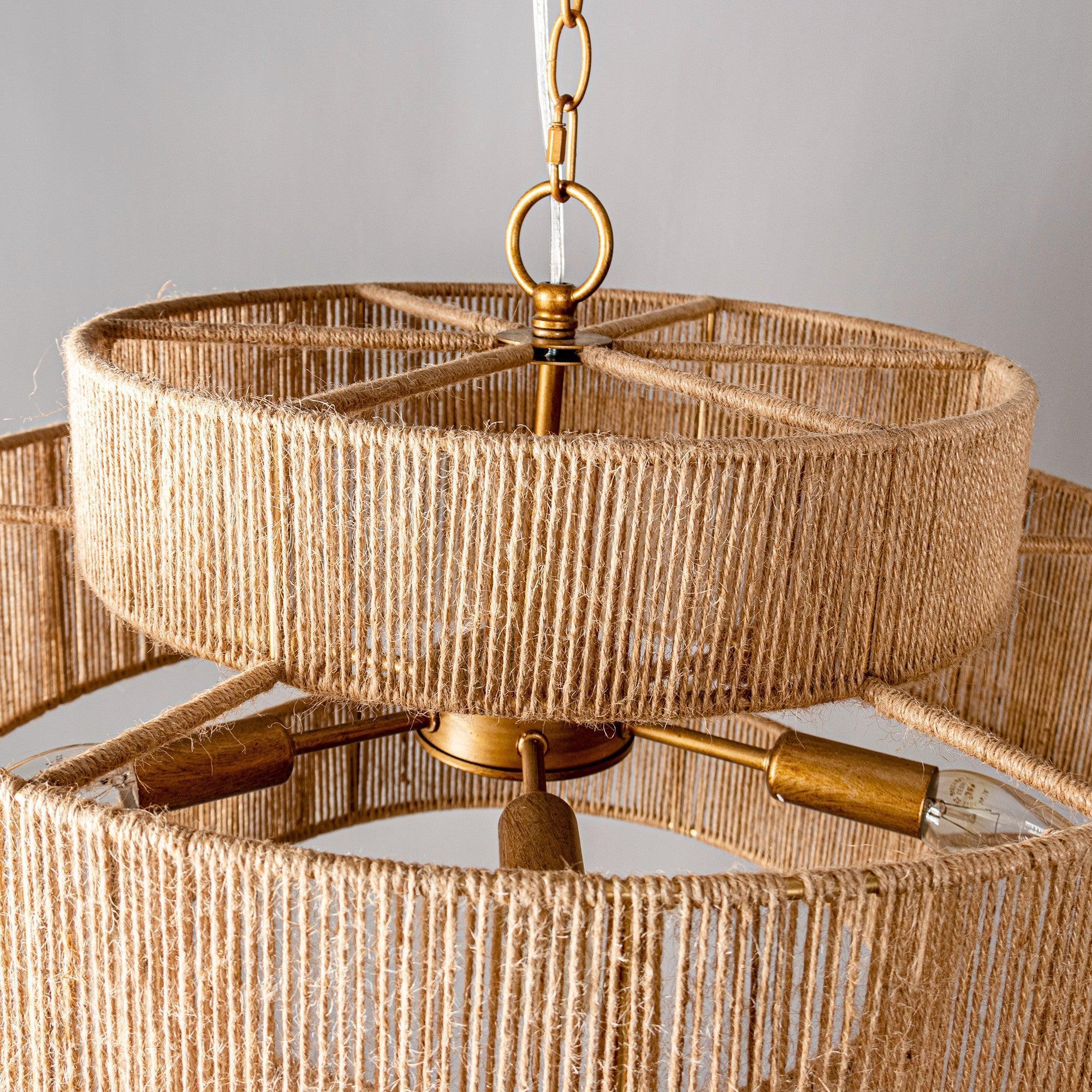 Natural rope drum chandelier underside with antique gold socket hardware and chain